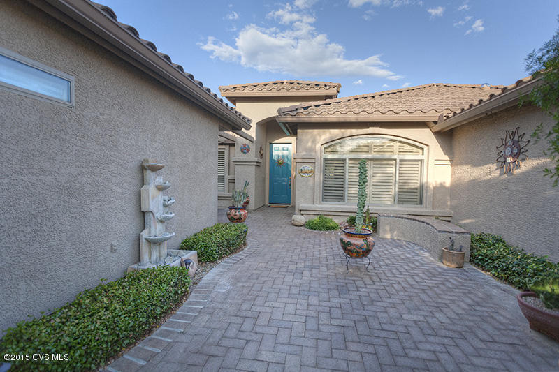 Lovely Laredo model with Casita offers open floor plan, wonderful spaces for entertaining inside and out, and a tranquil setting within the Quail Creek Country Club. Tile everywhere except bedrooms. Soft, tasteful southwest colors on the walls. Plantation shutters throughout. High ceilings and plenty of storage. Leased solar panels reduce electrical costs to less than $11 per month year-round. Property is located in Sahuarita, but has a Green Valley mailing address.