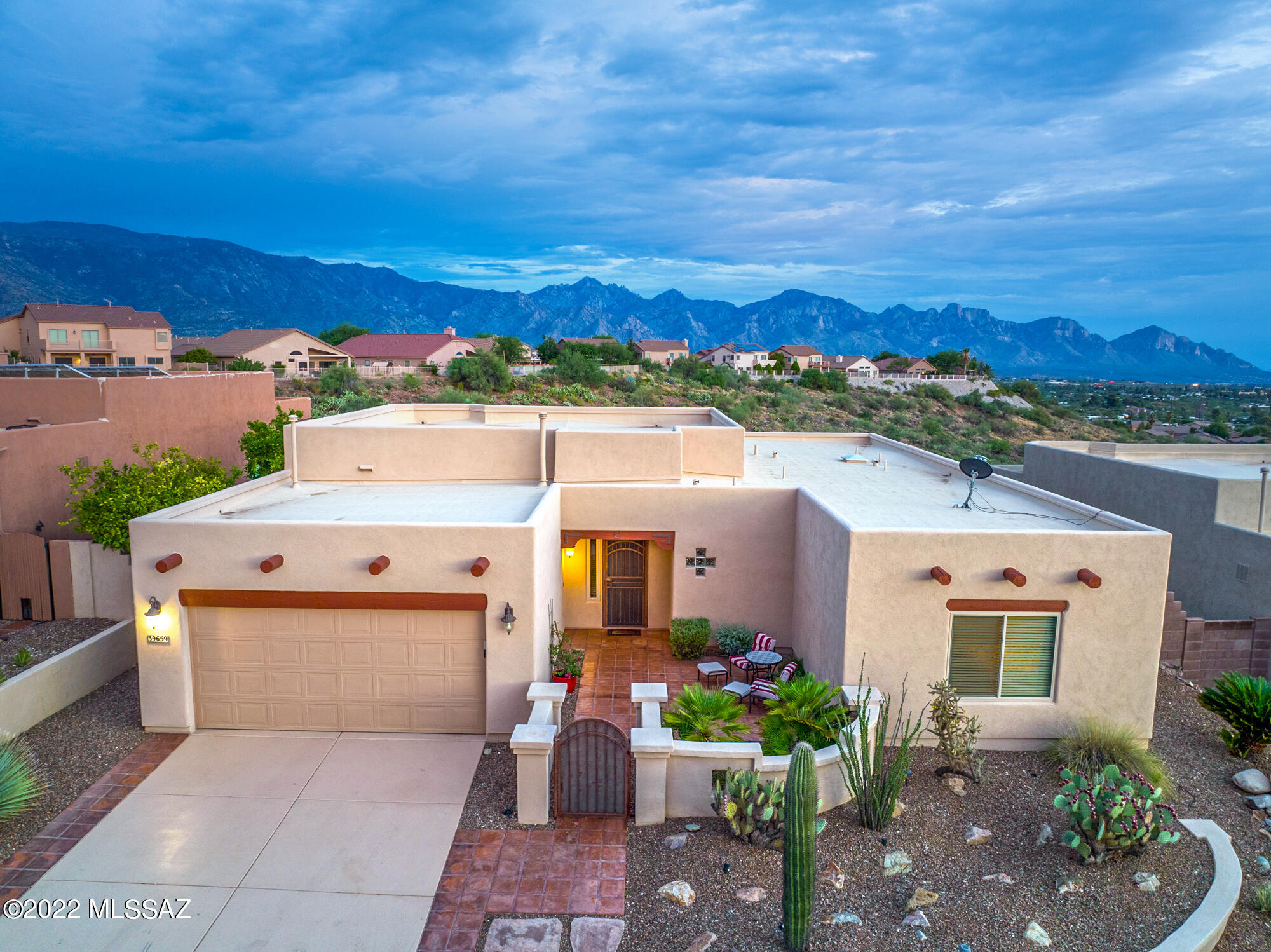 Views! This 4BD, 2BA house has stunning unobstructed views facing south from Catalina. It's meticulously maintained and ready to turn into your dream home or a perfect vacation rental property. Spacious kitchen, open floorplan, large covered patio and built in grill next to the sparkling pool where you can enjoy your evening cooking out and watching the sunset or monsoons, or monsoon sunsets! Lots of quality custom touches: Custom ceiling fans, wood vegas in the kitchen, tray ceilings, high ceilings, wood cabinetry. New carpet! Enjoy your morning coffee in the north facing courtyard, in the backyard watching the birds, or from nearly anywhere in the primary living space! See attached documents for age of major components; all recent.