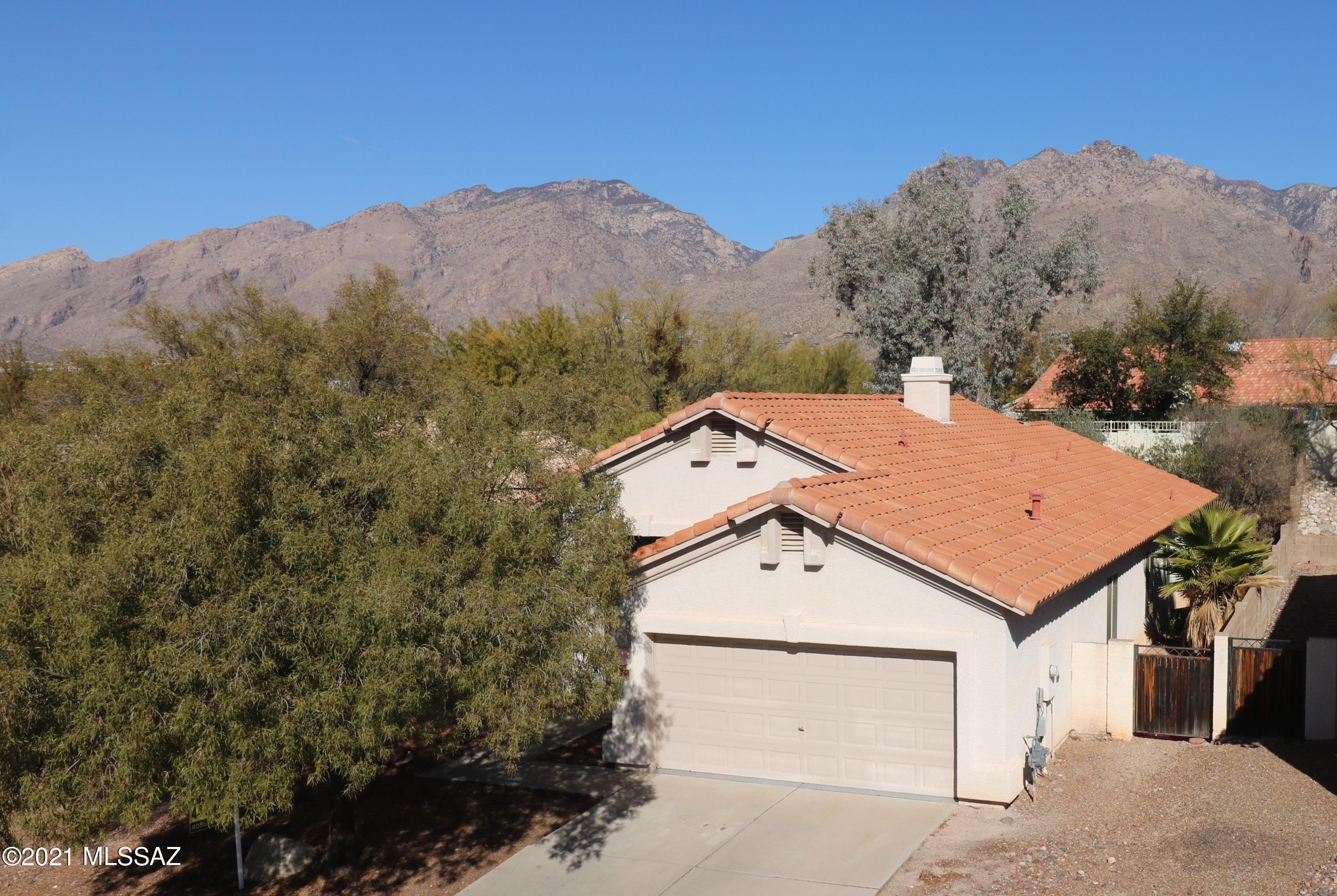 Amazing Sabino Canyon home w/ views of the Catalinas! Located in the desirable Ventana Vistas neighborhood with District 16 schools! Nearby hiking at Sabino Canyon. Large kitchen & family room. split bedroom floorplan, gas fireplace, high shelving, and ceiling fans throughout. Minutes away from some of the best shopping & restaurants Tucson has to offer. Currently tenant occupied and leased until June 30th, 2021.
