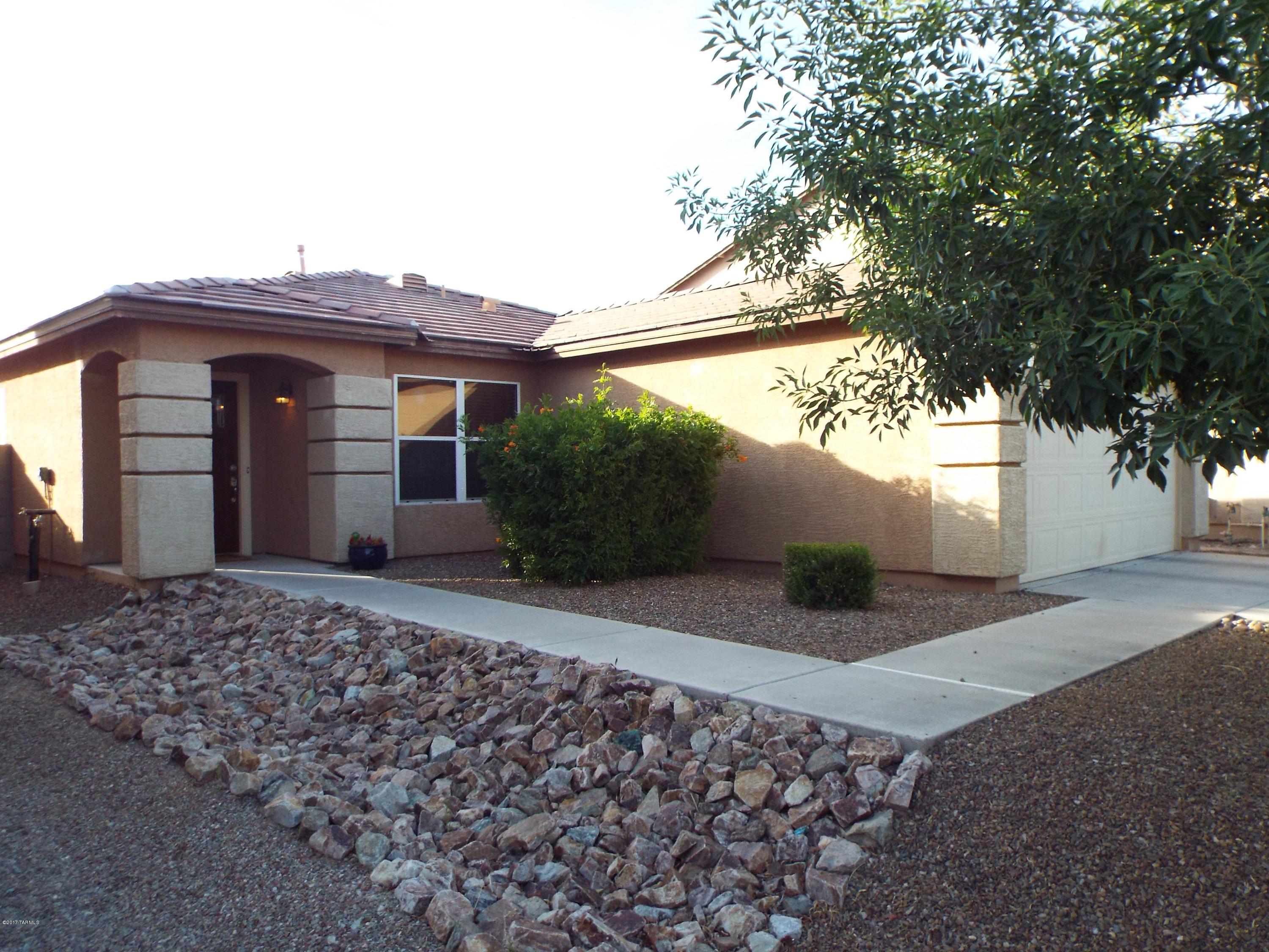 Beautiful 3 Bdrm/2 BA home in great NW neighborhood. Easy access to I-10, shopping, NW newest Outlet Mall. Home has very functional floor plan wit great room off kitchen, ceramic wood-like floor tile, custom paint, front entrance door, garden tub, landscaped yard and is move-in ready. New 2016 AC unit! Community offers playground, basketball court and hiking trail. Come See!