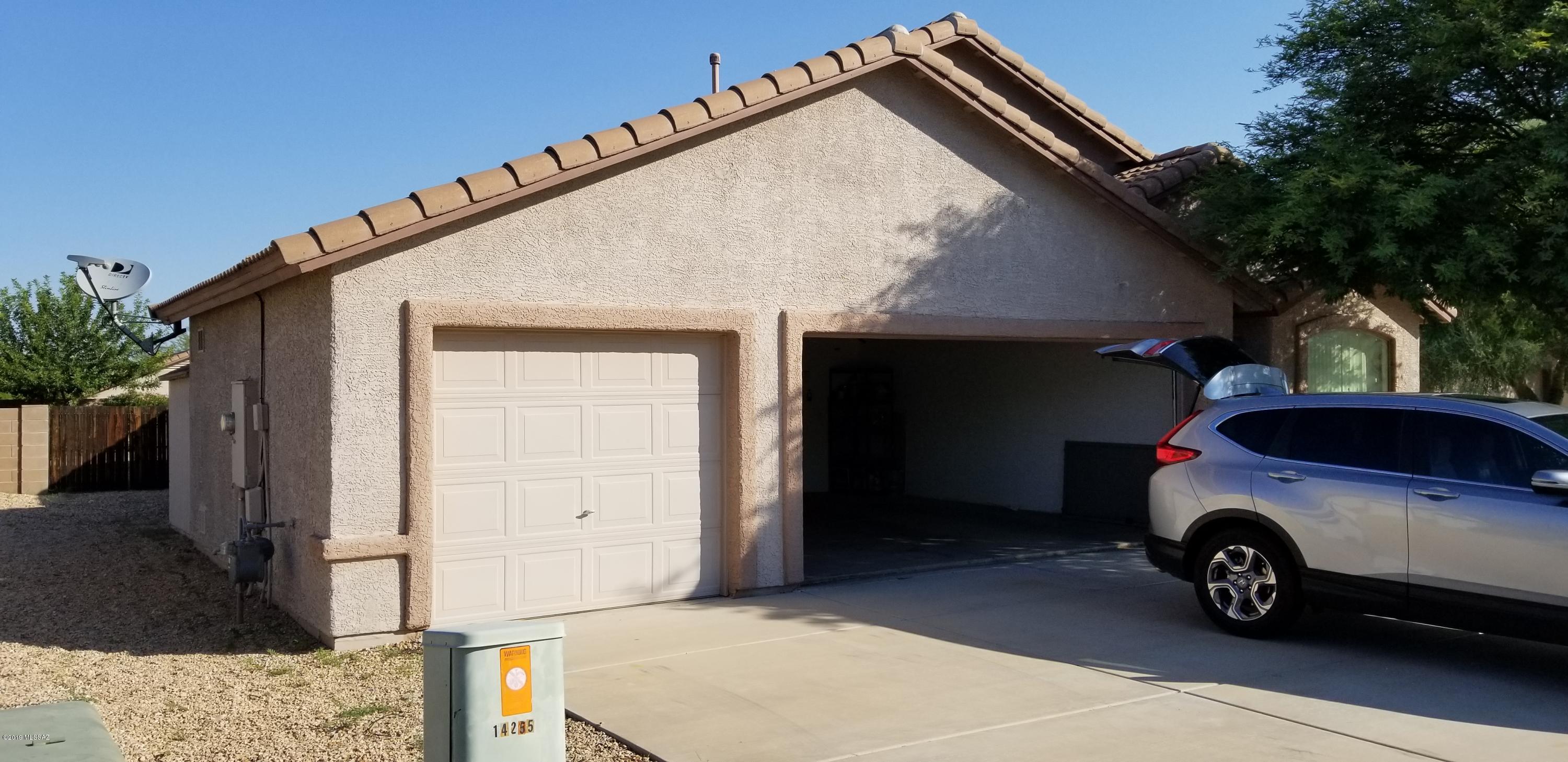 Great 4 bedroom 2 bath home on a Cul-De-Sac. Formal Living room with attached Dining area. Kitchen has newer SS Oven, Microwave and Fridge within last 2 yrs. (cream color fridge removed).  Kitchen opens up to eating area and Family room. Vaulted ceilings throughout with plant shelve and Jack n Jill hall bath. Private covered back patio that has a nice size backyard to enjoy gatherings and entertaining. Mountain views off of the patio to relax and enjoy the beverage of your choice. 3 car garage for your cars or additional storage. Please do not disturb Tenant's and call GREG @ 520 400 9017 .