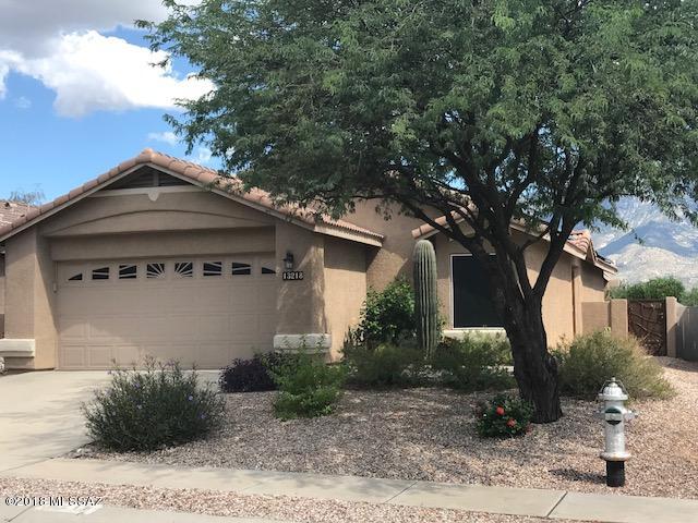 Breathtaking panoramic views of the Catalina Mountains from inside and out. Beautiful landscaping surrounds a sparkling Pebble Tec pool and waterfall. Bright, open floor plan offers a spacious great room, dining room, and updated bathrooms. Master suite includes gorgeous shower, dual sinks, and spacious walk-in closet. Modern kitchen features large quartz breakfast bar and stainless appliances. Come see this amazing Rancho Vistoso home!