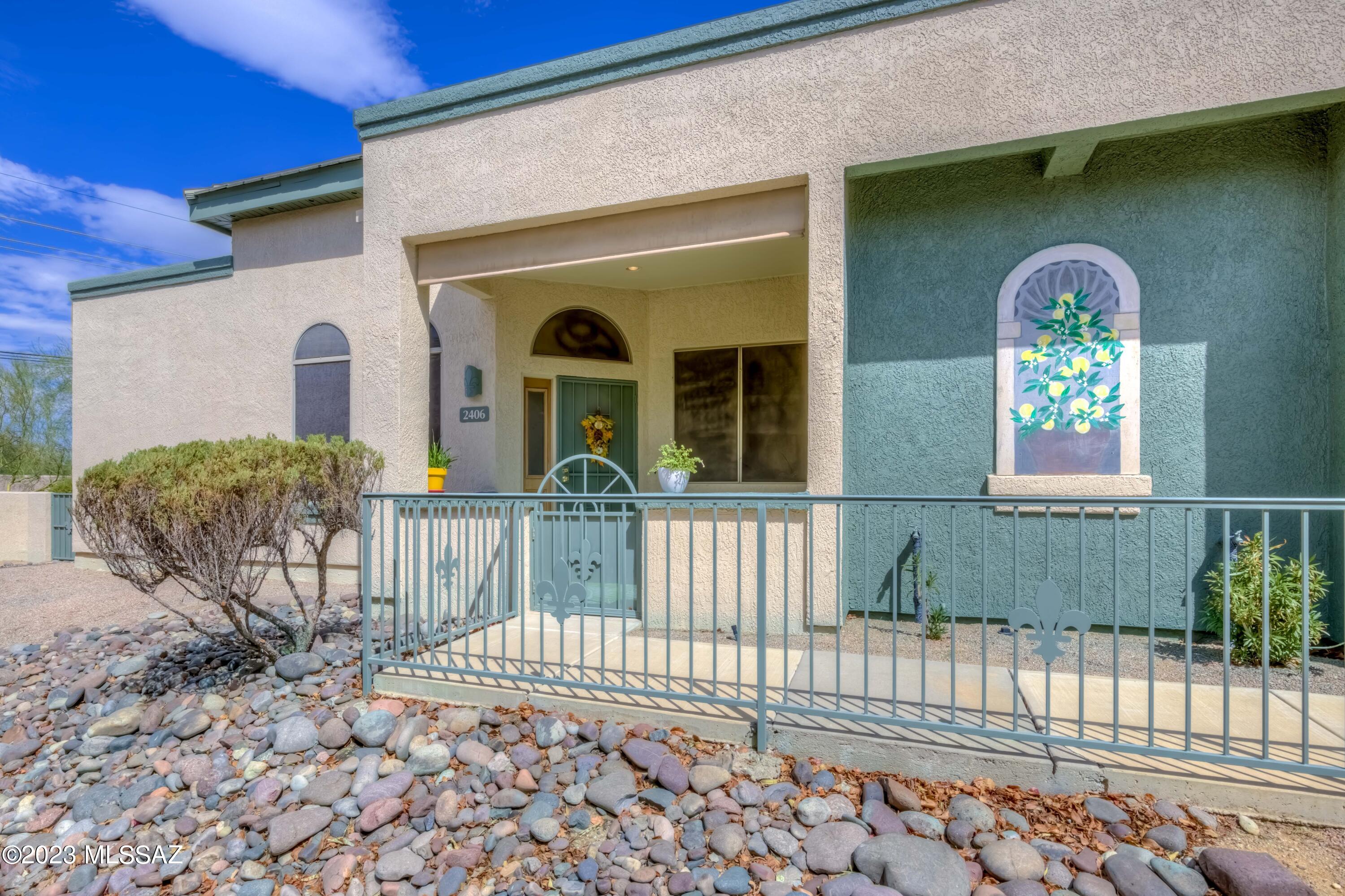 Beautifully Upgraded Townhome in Gated Mona Lisa Village! Home features Open Family Room with stunning cove ceiling, ceramic tile floors, custom paint colors, soaring ceilings thru-out, full guest bathroom, newer AC & Furnace system, front & back wrought iron screen doors, bonus front storage closet & much more. Private lot location backs to common area. Open Kitchen with upgraded wood cabinets, slide-out shelves, coordinated appliances, shelved pantry, bar seating & Dining Area just off kitchen. Spacious Master has walk-in closet and private slider to covered patio. Back patio has brick paver extension and mature trees behind with common area beyond. 45+/55+ community offers clubhouse & pool/spa with Catalina Mtn views!