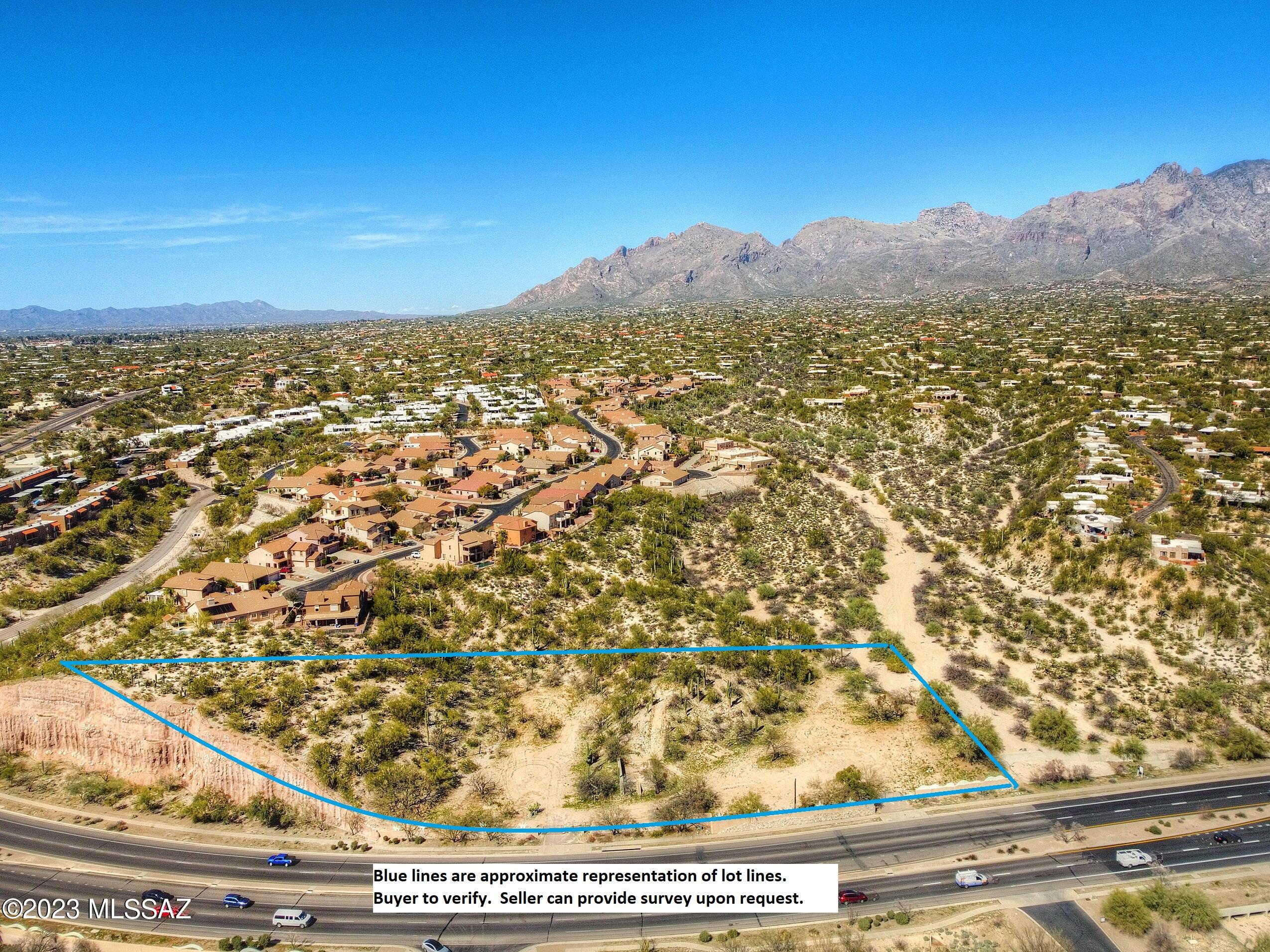 Great saguaro studded foothills lot w/ nice desert views and city lights from up on the hill tops.  Large lot features multiple options for your custom home.  3.57 acre RX1 lot allows for up to 3 homes.  Possible commercial or mult-family use (w/ zoning change) w/ great visibility along River Road.   Don't miss this great development opportunity!  Electric and Water on Site.  Water well on site in non-working condition.  Buyer to verify all uses.  Seller has survey and can provide upon request.