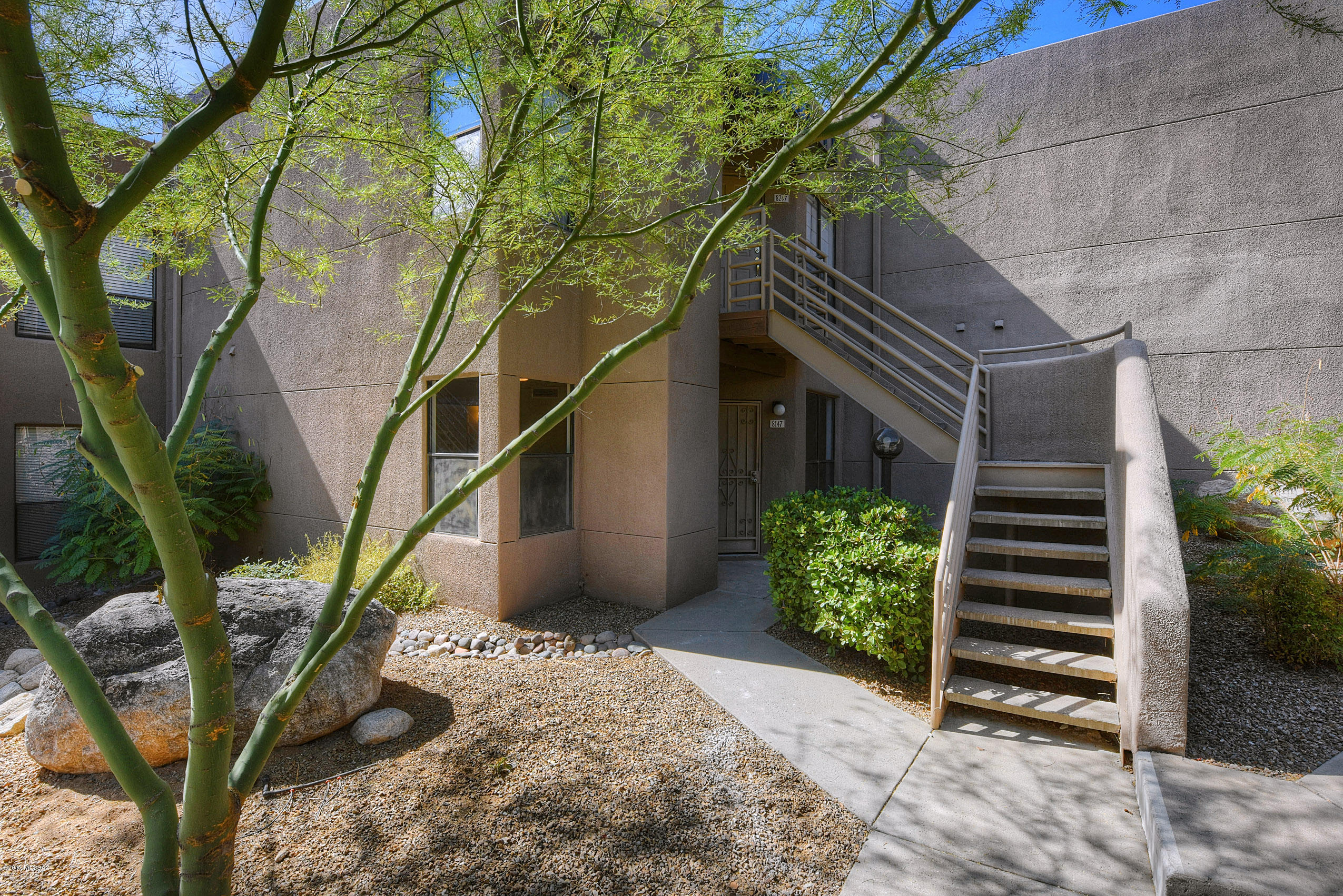 Gorgeous convenient ground floor condo nestled in the heart of Ventana Canyon! This beautiful spacious 2 bedroom 2 bath home boasts over 1000 square feet of living space with plenty of closet space. Recently renovated in September 2017. This charming home has a lot of new features that include new wood plank looking ceramic tile flooring throughout except carpet in the 2 bedrooms (split bedroom plan), doors, two tone paint, granite counter tops & stainless steel appliances. Resort living at its finest with 2 club houses, 2 heated pools/spas, tennis court(conveniently right next to unit & lighted) access to Ventana hiking trails & workout facilities all within seconds from your new home! Don't miss out on experiencing the luxury of peaceful living!