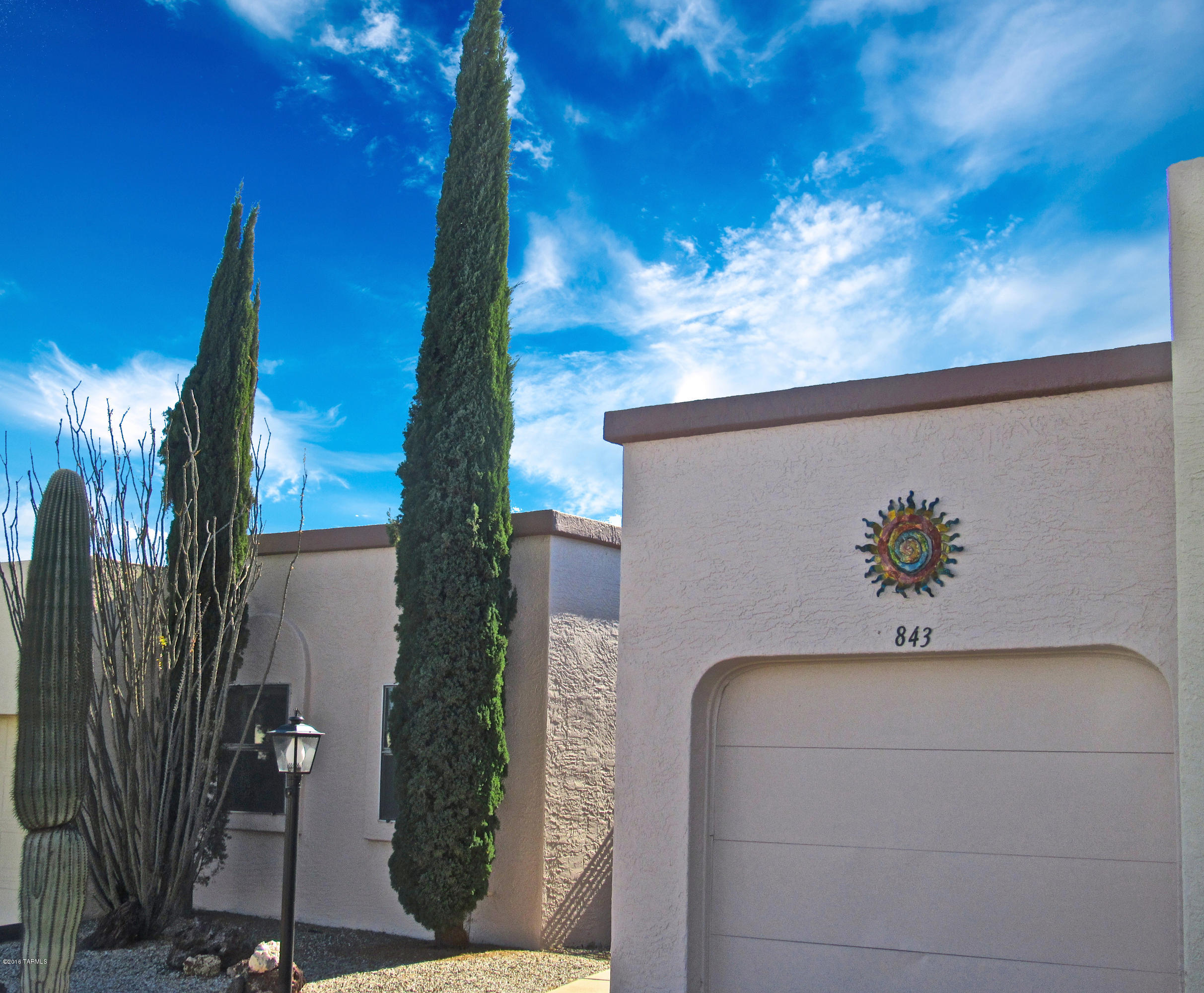 Don't miss this light, bright, and airy townhouse with two bedrooms, two baths, eat-in kitchen, garage, and separate laundry.  It boasts 1,252 sq ft and has been lovingly cared for.  Home is conveniently located in popular Continental Vistas, close to shopping,  golf, and GVR facilities.  The private rear patio overlooks a desert arroyo and offers a stunning mountain view.   This is a perfect spot to entertain family and friends.  Enjoy your morning coffee, or evening cocktails, while watching the ever changing Santa Ritas.  Great winter residence or full-time home.  Live the AZ lifestyle!