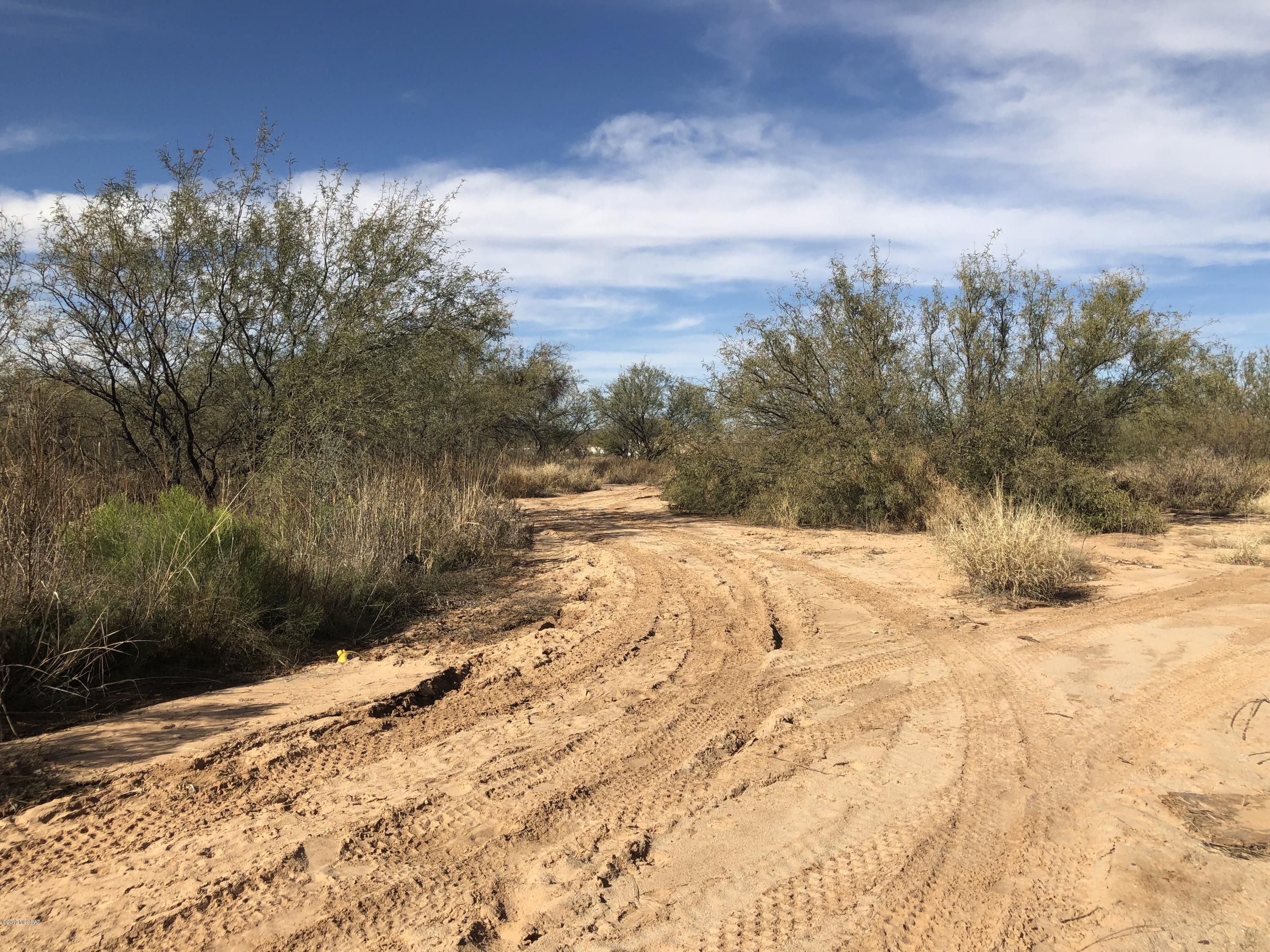 One acre, and perfect for mobile home and horse property. NICE FLAT USEABLE ACRE WITH SEPTIC AND UTILITIES TO THE HOME SITE. SELLER IS WILLING TO CARRY NOTE.