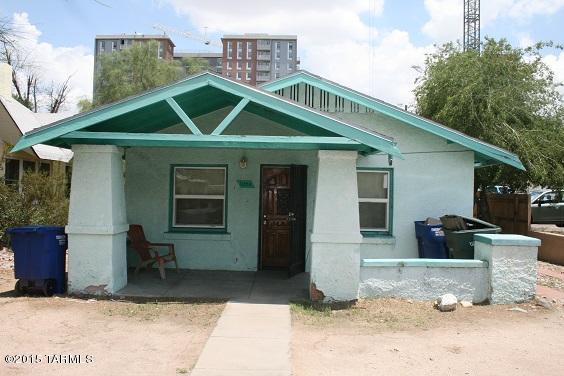 CLOSEST house for sale to the University of Arizona on Euclid the tenants literally walk to class. This huge lot offers two buildings consisting of two bedroom one bath units. Major upgrades to the front house have been completed, it also includes a full basement that could be considered a room/storage/office. This is a great investment opportunity where both houses have been consistently rented for years. Potential to be deemed commercial property in the future which would increase the value dramatically.