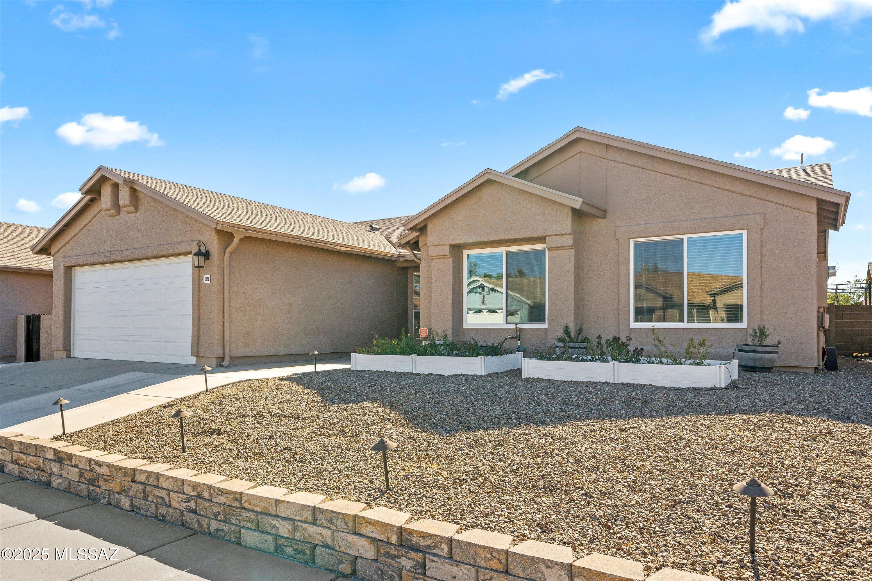 Meticulously updated with thoughtful upgrades throughout, including the kitchen, bathrooms, flooring, and lighting - no detail has been overlooked. Upon entering, you are greeted with lots of natural light & a neutral color palette. The spacious, fully remodeled kitchen boasts ample counter and cabinet space. The expansive great room is inviting, featuring a new sliding door that opens to an extended outdoor area ideal for gatherings. The backyard, with direct access to lush green space, a park, and a basketball court, provide you with an endless backyard. All bedrooms are generously sized & feature new windows. Both bathrooms have been beautifully renovated adding to the home's modern updates. The list goes on and on. The cherry on top - NO POLY PIPES! This property is a true must see.