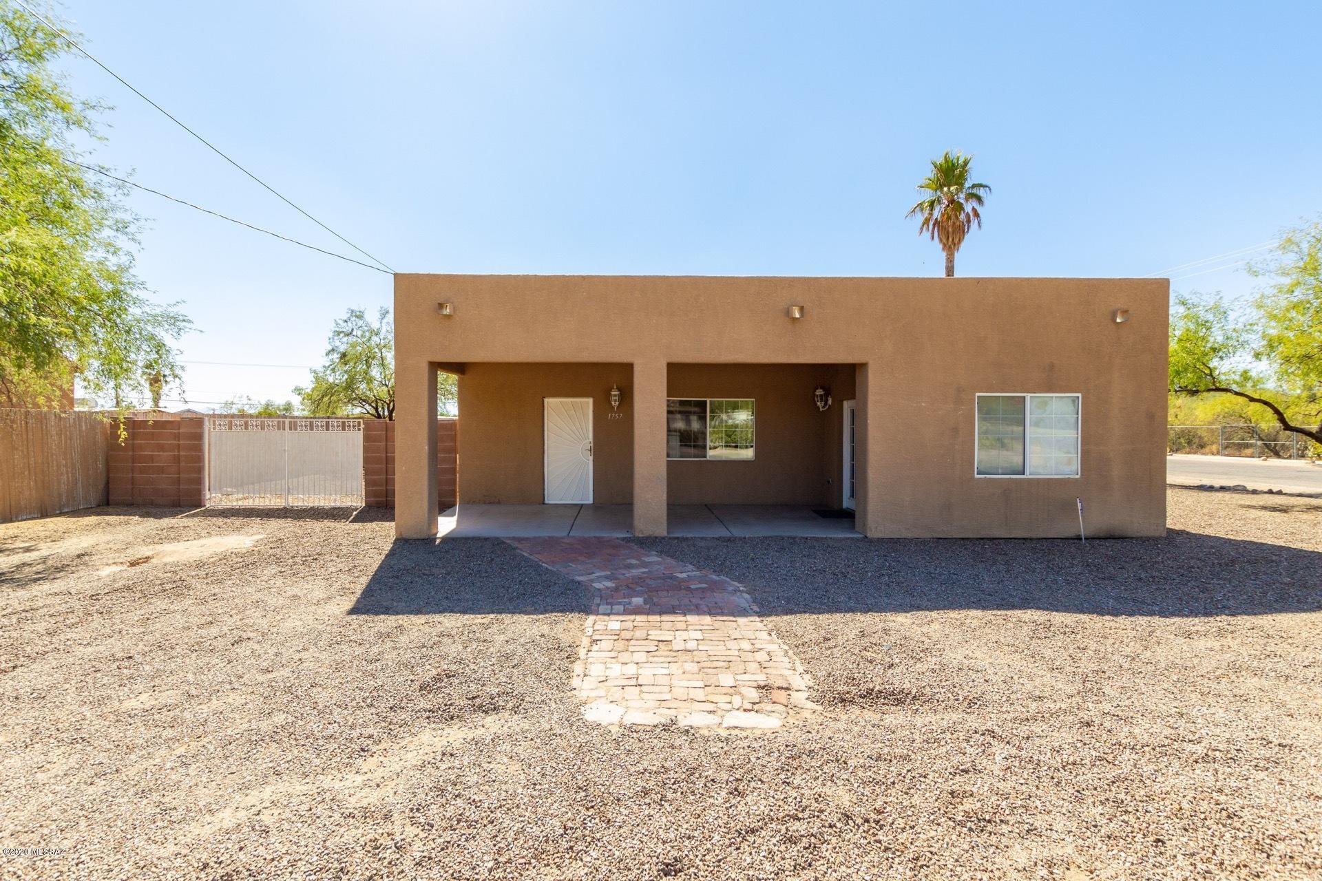 Truly move in ready, handsomely updated home on a corner lot. Brand New AC installed last year. Ceramic tile everywhere except the bedrooms. Plenty of storage in the open kitchen with stainless appliances. Brand new carpet, fresh paint, soaring ceilings, large bedrooms, a super sized garage and all of this for a great price. 
Make this your home today!