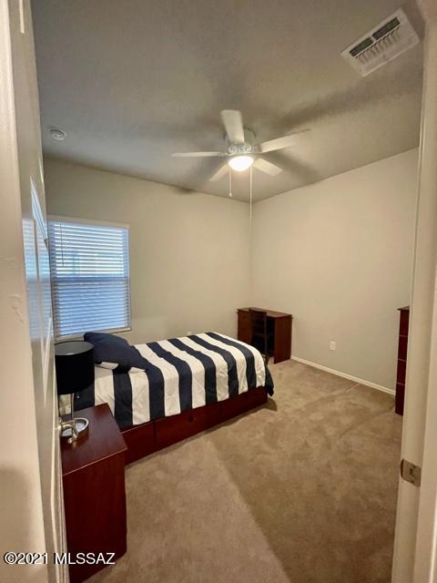 AVAIL 6/12/21! Located near I-10, schools, splash park, library & comm park/ pool, and up & coming shopping centers;  1-story boasts 2,219 sq.ft. with 4 bds, 3 full bths, and bonus den or frml dining area. One of the best lots in the subdivision, w/privacy to the East & South of the home!  Kitchen features a stnls steel appliances and granite countertops.  Double sinks in hall & master bths.  20x20 tile floors throughout and carpet only in 4 bds.  Ceiling fans in all bds and great room, and linen storage/ pantry/ large mstr bd closet. Gas drop for bbq, ceiling fan & tv outlet on back patio.  Dbl gate into prof landscaped low mnt bkyd that is perfect for entertaining and has great views of open/ grass areas and sunsets!  Bonus features: soft water loop, tankless w/h and more! Owner/Agent.