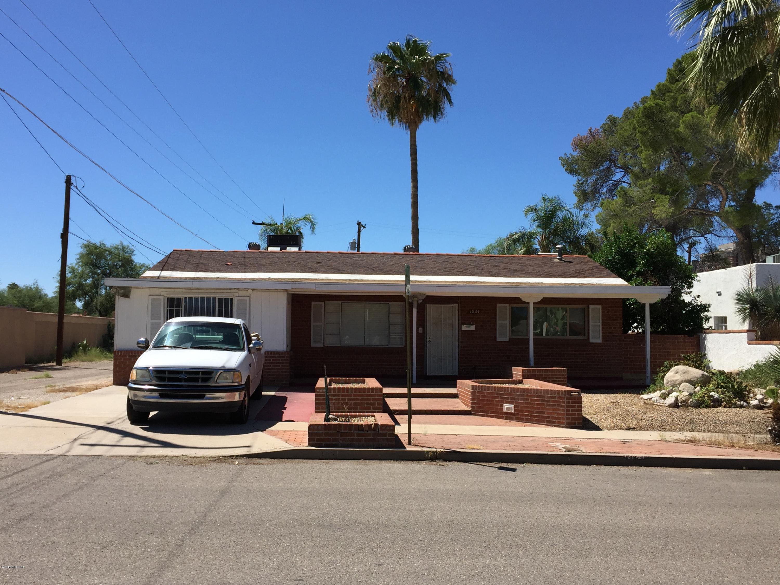 Location Location Location! Move-in ready 4 bedroom plus two bonus rooms, 2 bathroom close to the University. Pool is maintained by the property manager.