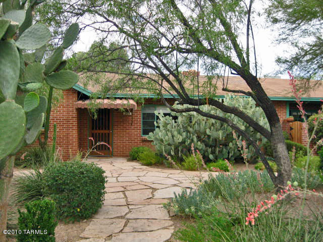 Built in 1951, Charming 3br, 2ba brick home in Encanto Park neighborhood, beautifully remodeled with elegant touches, wood & tile floors, cooks kitchen w/granite counter tops & custom cabinets, stainless steel appliances include fridge, DW, MW, stove/oven, disposal. Split bedroom floor plan, master suite w/high ceilings & walk-in closet. Long covered patio and huge back yard. 1 pet allowed not to exceed 40 lbs. No puppies or restricted breeds and $25.00 Month Pet Rent. Monthly Landscaping service included. Security Deposit $2850.00. Only fully qualified candidates for this home considered. **$28.00/month Mandatory enrollment in Resident Benefit Package. Includes HVAC filter delivery and more! Ask agent for details.
