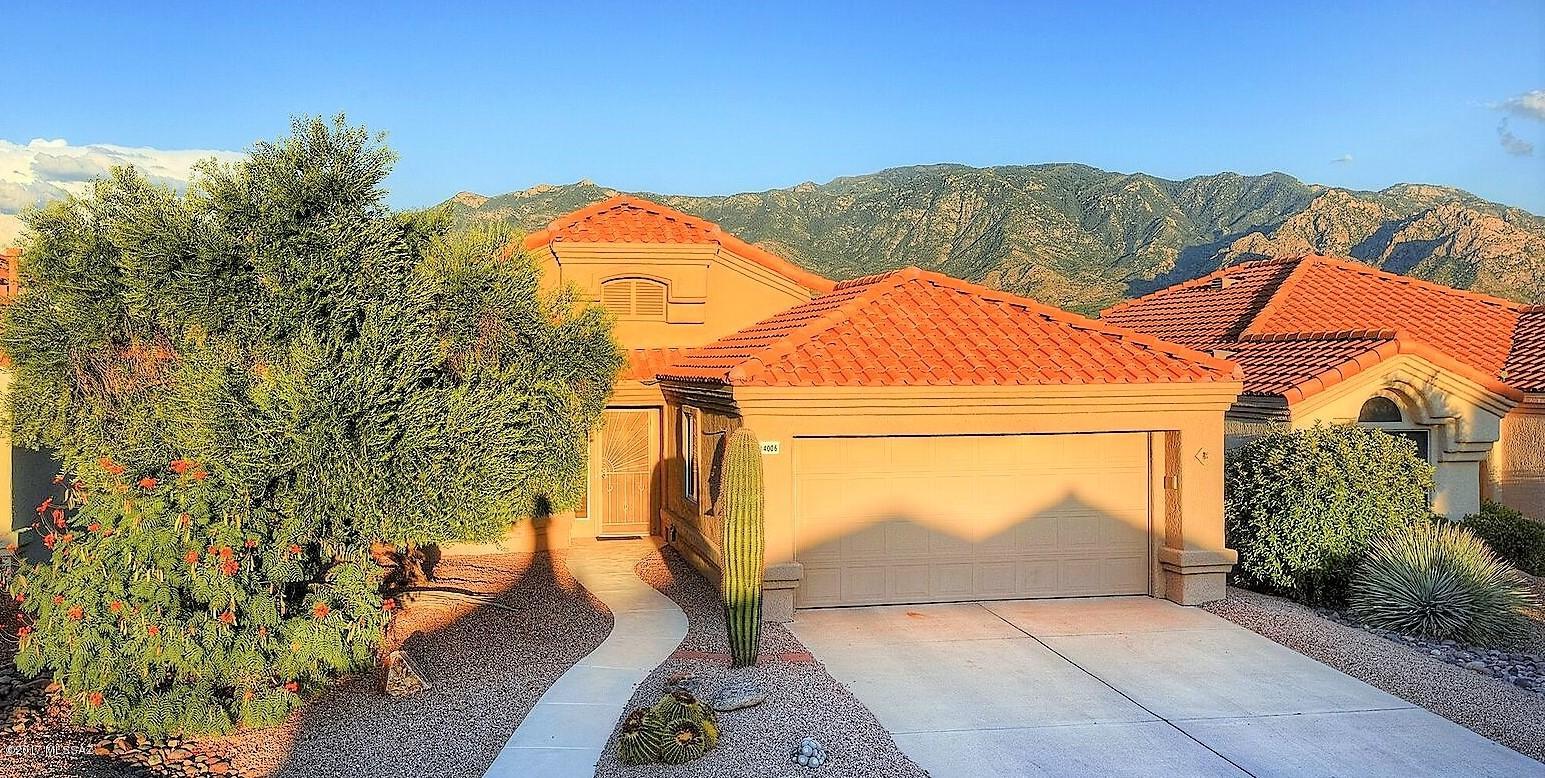 Sun City Oro Valley Mountain View Lover's Delight! This Gorgeous Sonoran Model Home is a Great Price! Lovingly Updated with Top Quality 18'' Italian Tile & Expanded with a Bonus Room to further enjoy the Panoramic Catalina Mountain Views from the back! This 1,657 sq. foot, 2 BR 2 Full Bath Home boasts Open Kitchen, Dining Area and Family Room also Open Living & Dining Rooms, Big Dual Pane Windows, Plantation Shutters, Large Master Suite featuring Walk-in Closet, Fabulous Walk-in Tile Shower, Dual Sinks & Desirable Split Bedroom Floorplan. Pocket door from Dining Area creates Visitor's Suite. If you are looking for Mountain Views in Sun City, you have found it! This Magnificent home won't last long. See it Today! Sun City Amenities include: 18 Hole GC, Pools, Rest., Ftns. Ctr., Clubs, etc.