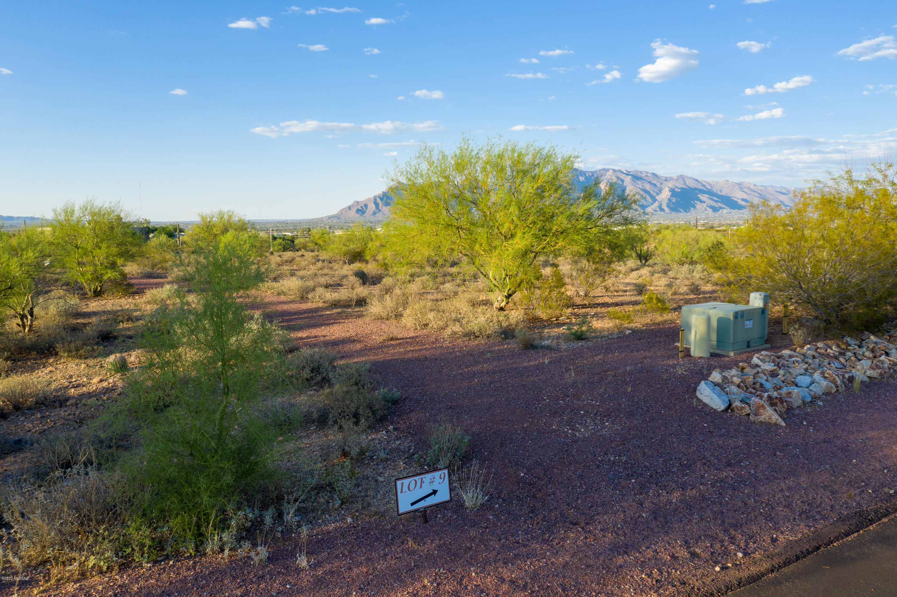 This irresistible 1.79 acre lot is located between two washes providing an abundance of natural open space and lush desert landscape. This lot includes a private driveway and expansive space for your future home. Very attractive location within the Las Nubes Subdivision. 1 of 14 well planned custom home sites in this gated community with paved streets, walking trails and beautiful views. Come check out this spacious and desirable lot today! This is 1 of 14 available lots in the Las Nubes Subdivision. Please see for the 14 individual lot Parcels and MLS Numbers: Master Parcel: 103-19-2280 - MLS #: 22019050 LOT 1  Parcel: 103-19-2140 - MLS #: 22019798 LOT 2 Parcel: 103-19-2150 - MLS #: 22019799 LOT 3 Parcel: 103-19-2160 - MLS #: 22019801 LOT 4 Parcel: 103-19-2170 - MLS #: 22019805 LOT 5 Parcel: 103-19-2180 - MLS #: 22019807 LOT 6 Parcel: 103-19-2190 -MLS #: 22019811 LOT 7 Parcel: 103-19-2200 -MLS #: 22019816 LOT 8 Parcel: 103-19-2210 - MLS #: 2201981 LOT 9 Parcel: 103-19-2220 - MLS #: 2201981 LOT 10 Parcel: 103-19-2230 - MLS #: 22019820 LOT 11 Parcel: 103-19-2240 -MLS #: 22019822 LOT 12 Parcel: 103-19-2250 -MLS #: 22019826  LOT 13 Parcel: 103-19-2260 -MLS #: 22019827 LOT 14 Parcel: 103-19-2270 -MLS #: 22019828