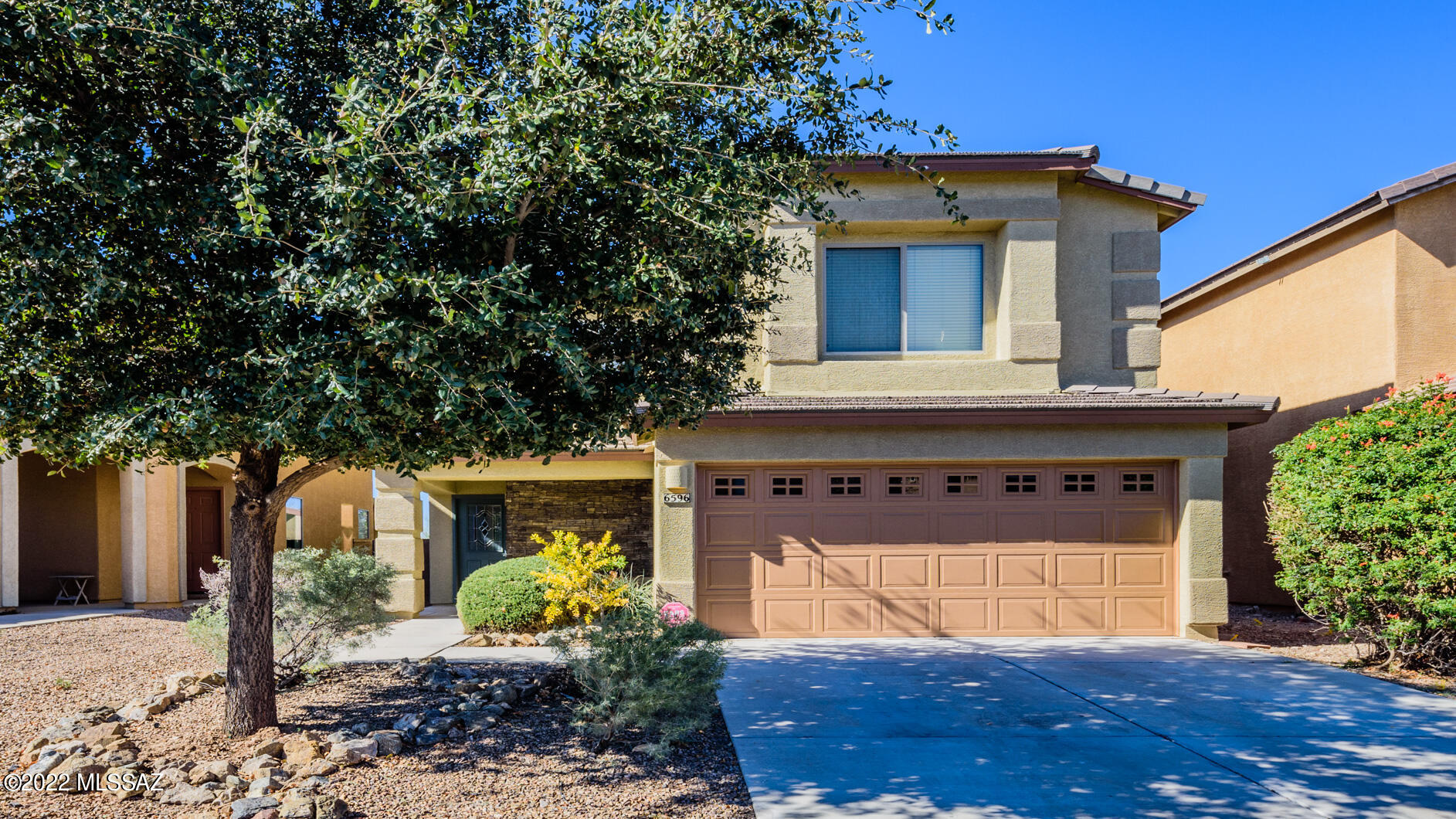 This immaculate home has it all!! Enjoy the spacious 1896 Sq Ft, 3bd/2.5 bath with a loft that has new exterior and interior paint, brand new upgraded carpet, walk in closets in all bedrooms, stainless steel kitchen appliances and front load washer and dryer with pedestals!!  Upgraded ceiling fans throughout, built in surround sound speakers in family room and tasteful blinds round out this beauty! Relax in a large master bedroom with dual vanities , walk in closet and large shower!!  Convenient neighborhood, close to I-10, Raytheon, Davis Monthan AFB, Pima Air and Space Museum, U of A Tech Park, Amazon and Home Goods Distribution hubs and more!!  Priced right and ready to move!!