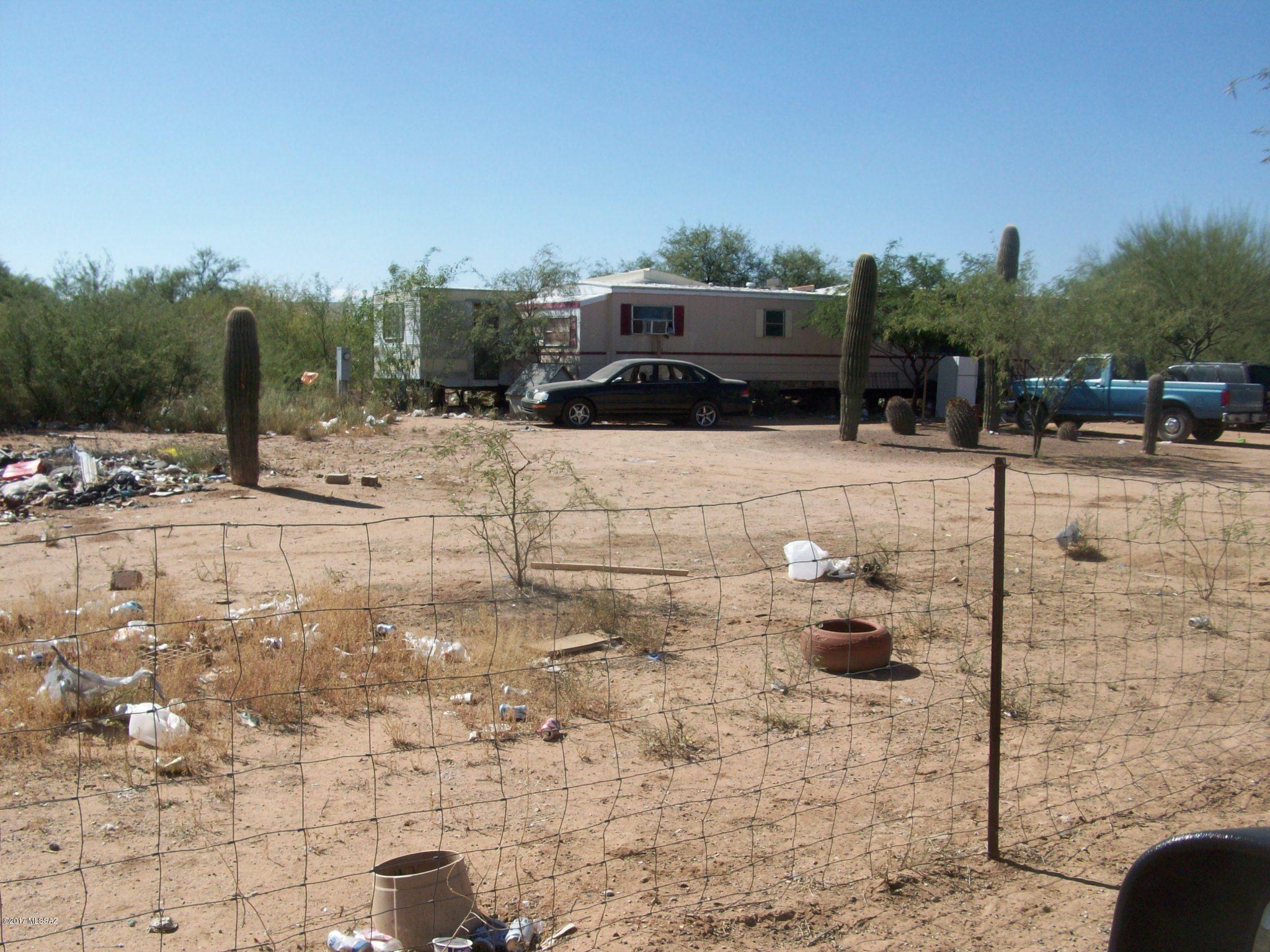 Over an acre with water and septic - needs some clean up but, could be a great homestead. Drive-by only.