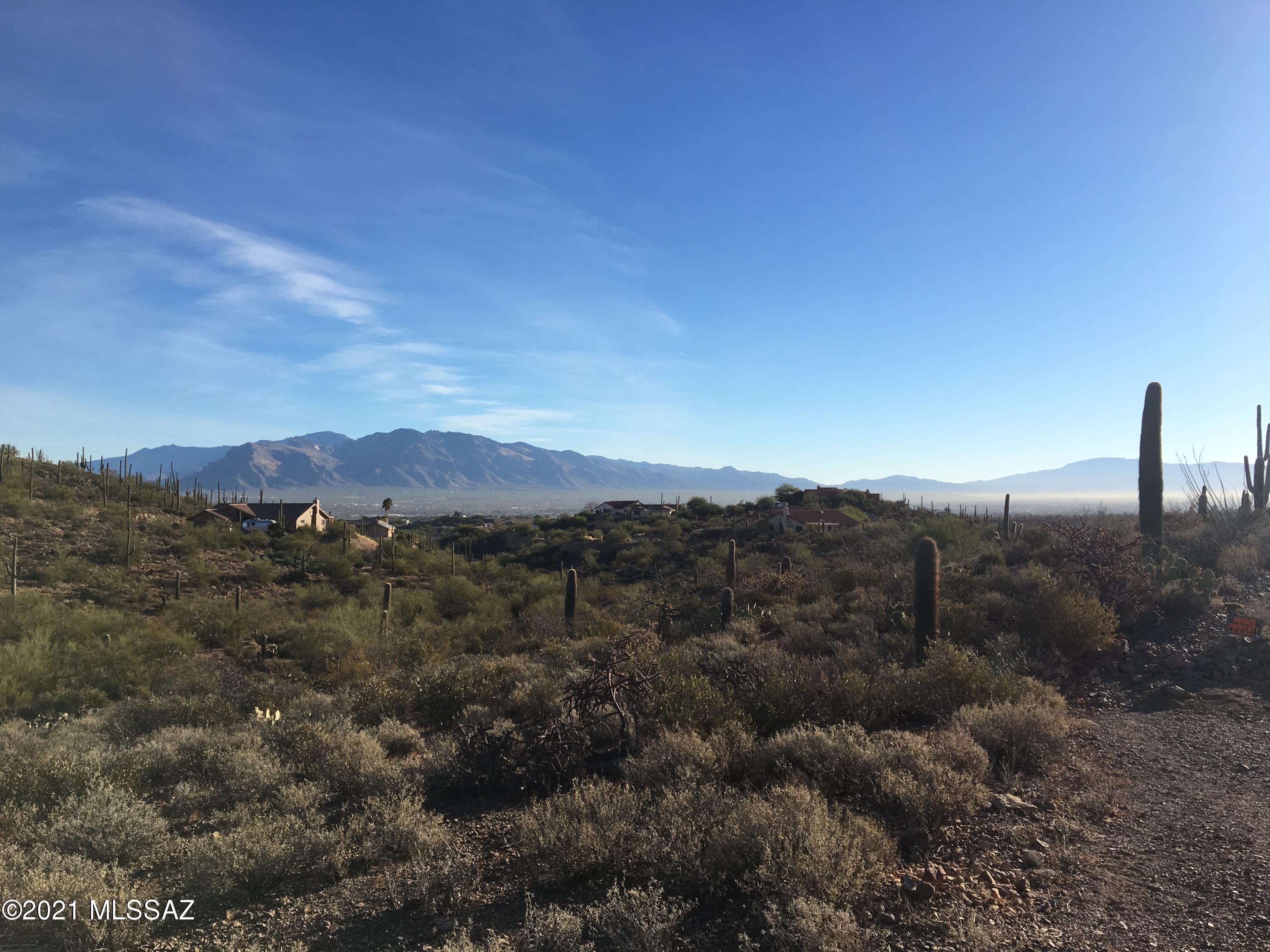 Stunning city and mountain views of the Santa Catalinas to the northeast and the Tortolita mountains to the west. Plentiful saguaro cacti and borders the Sweetwater Preserve to the south! TEP and City of Tucson water available, see MLS documents tab for facility maps. Septic required. Purchase along with 4138 N. Gerhart Road for a total of 11.75 acres. See MLS #22023674. Potential to combine three parcels in area as well. Call for further details!