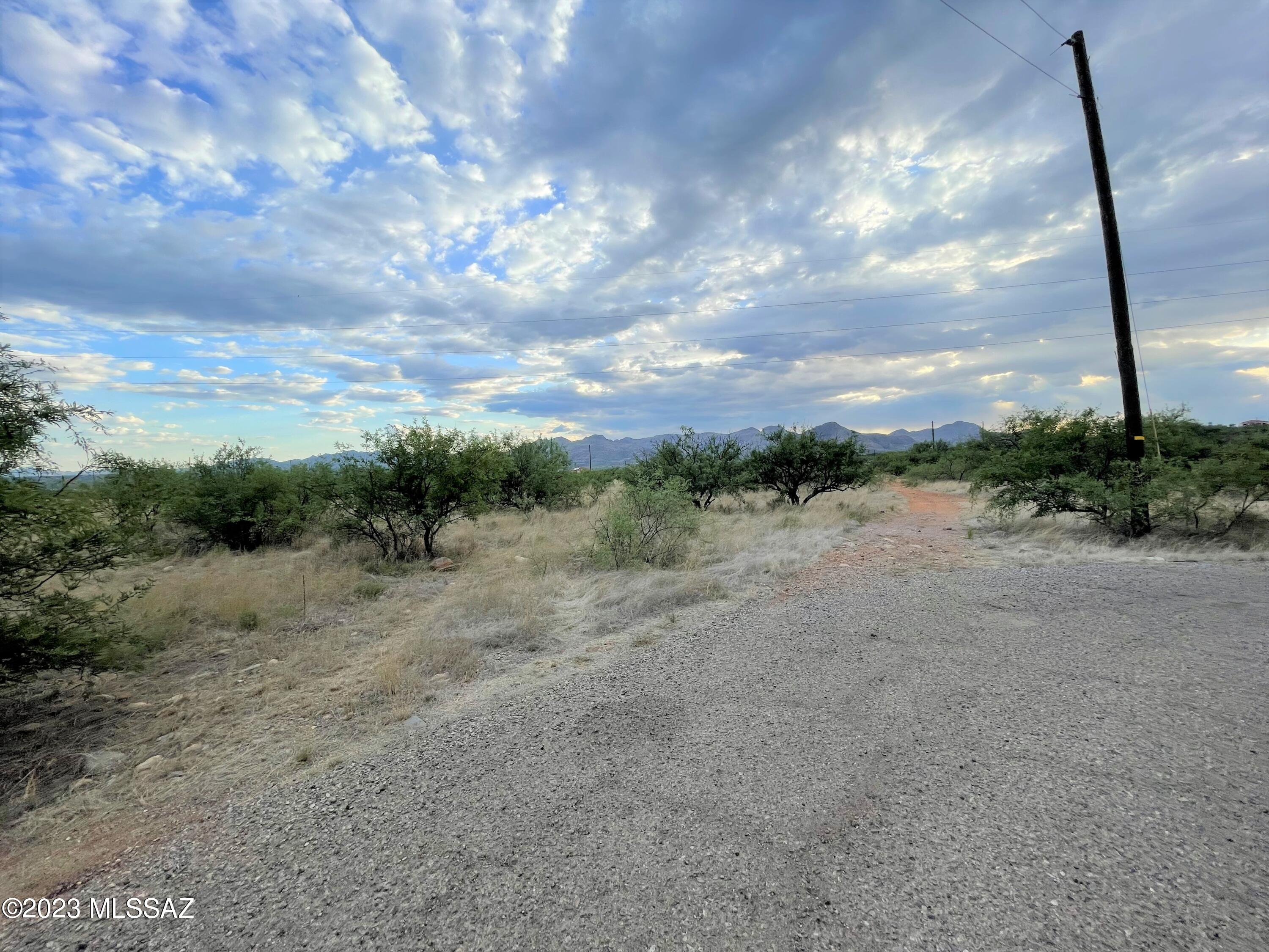 Flat, corner lot with views! Ready for development. Electric, water, and sewer are nearby. Paved road and is near the interstate. Just minutes away from dining and shopping areas.