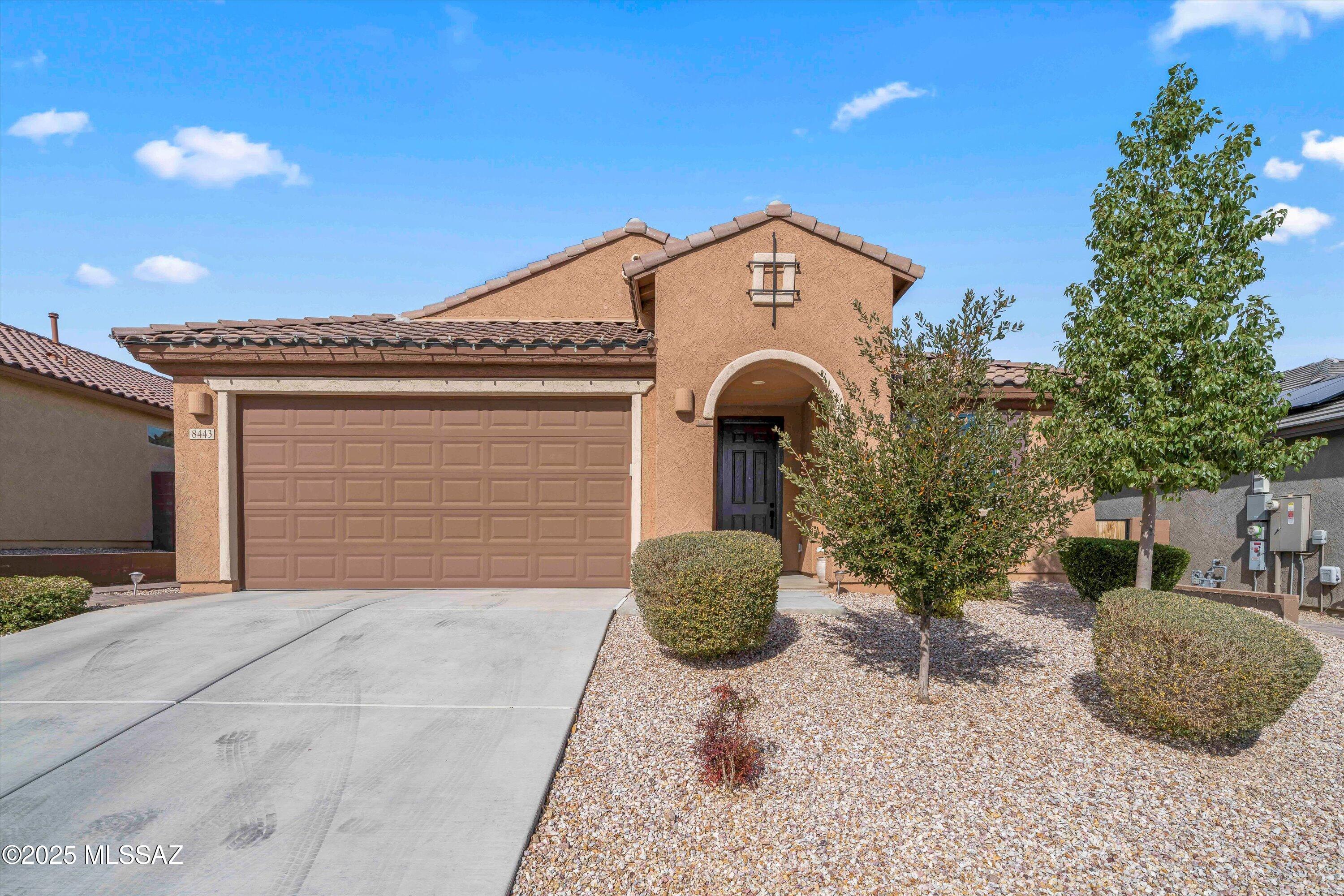 Stunning home features the popular Barletta floorplan, perfect blend of comfort and luxury. 3 spacious bedrooms, den with elegant French doors, & 2.5 car garage. Chef's kitchen boasts a wall oven/microwave, gas cooktop, French door refrigerator, and Walk-In Pantry, Breakfast Bar Island & Dining Area. Owners Suite enhanced by bay window, luxurious bath with glass walk-in shower, granite dual vanity & walk-in closet. Enjoy large secondary bedrooms and ample storage throughout. Laundry Rm with washer, dryer, and sink. Upgraded tile throughout with carpet in BR's and Whole House Water Softener/Purifier. Beautifully landscaped backyard, serene common area, stunning mountain & sunset views, complemented by a fountain and gas fire feature and Spa. Located in a gated community for added privacy.