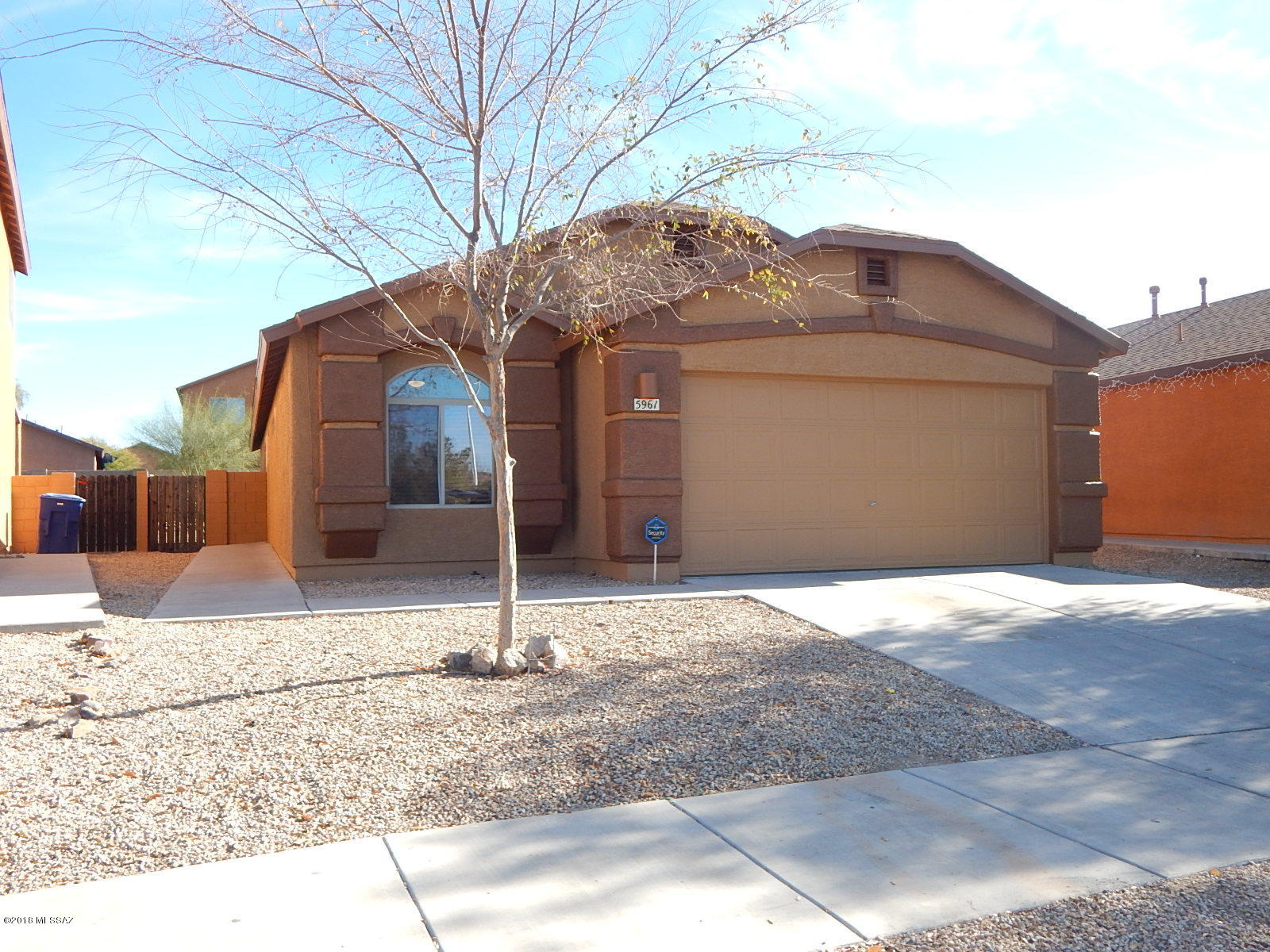Recently updated home in located in the heart of Tres Pueblos community right across 4 acre community park with basket ball court, bbq grills, running/bicycle path & play area for children. This spacious 3 bedroom, plus extra room/den that can easily be used as a 4th bedroom, has a nice open floor plan with tile throughout, vaulted ceilings, extended garage for that SUV or extra storage space, & covered patio with low maintenance backyard great for entertaining. Also includes microwave, stove/oven, dishwasher, garbage disposal, washer, dryer, garage door opener. <FONT COLOR=RED>Recently installed new LED ceiling fans, and freshly painted interior & exterior.</FONT> Located with easy access to I-10 & near UofA, Davis-Monthan AFB, Airport, Raytheon, COSTCO, restaurants, schools & much more!
