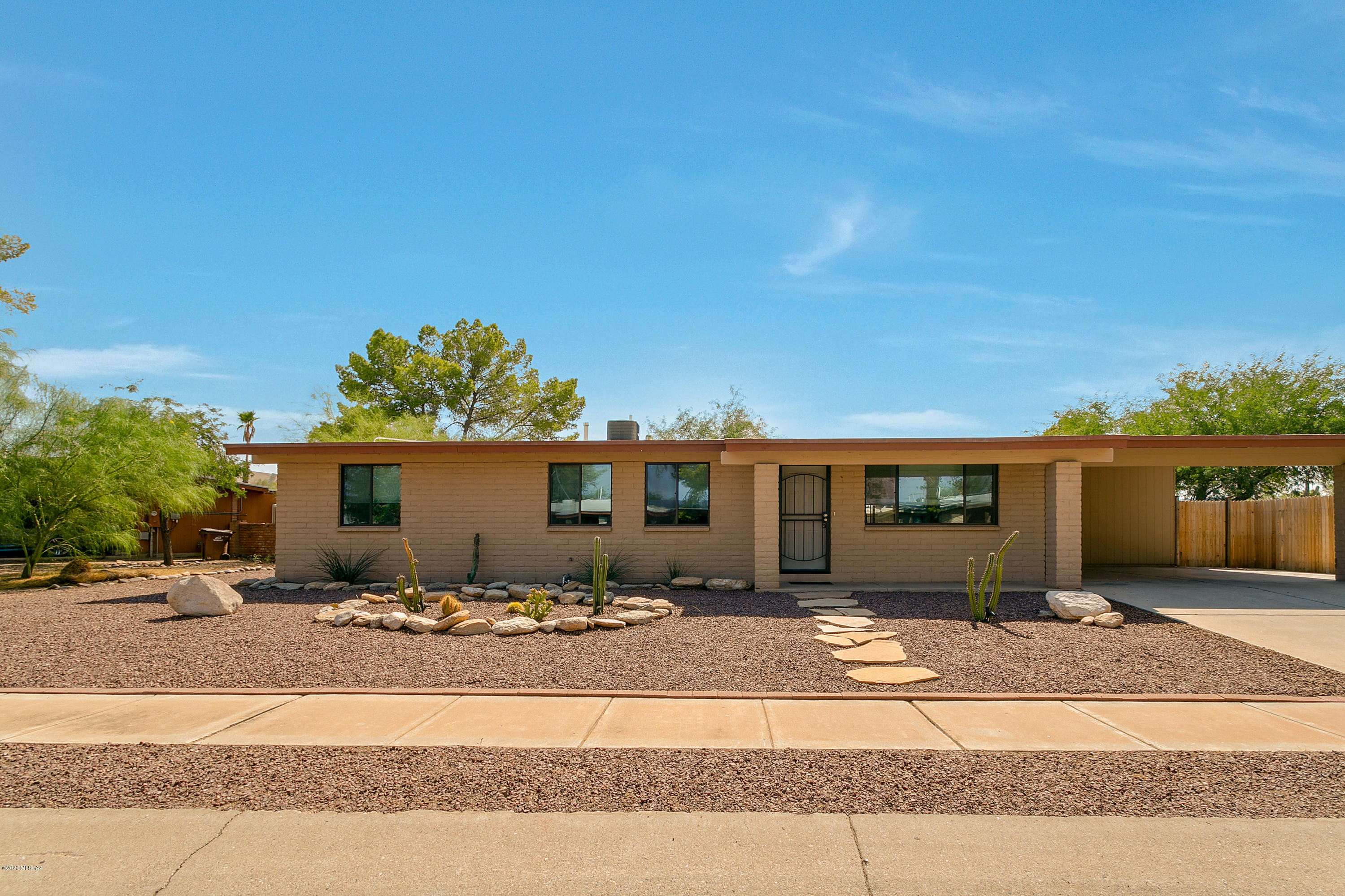 PICTURES ARE WORTH A 1000 WORDS CHECK THEM OUT!!!!!!!!! Completely remodeled within the last three years. Four beds , two baths,  plus fifth bedroom/den and work studio. New roof, AC, appliances, paint, baths, fans, lighting , shades, tile throughout,  oversized yard with RV parking and new wood fence.