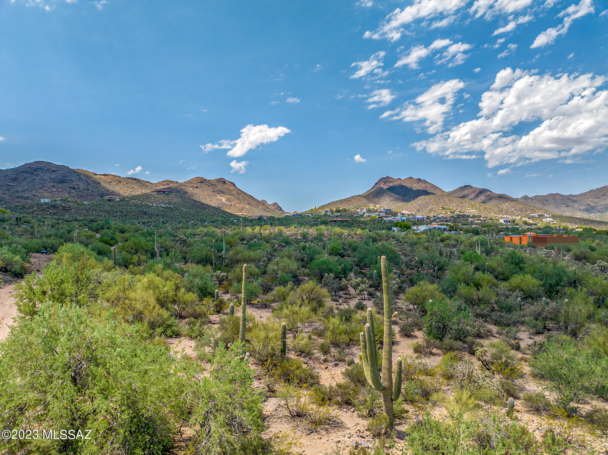Bring your buyers to see this lovely 4.63 acre parcel on the Gorgeous West Side with stunning panoramic views where they can build their custom dream home! Highly sought after area near Gates Pass, Wildlife Museum, Old Tucson, and the Desert Museum. Very private and secluded area yet so close to town. Saguaro studded beauty and sunsets you dream about! Come & walk the property today! Neighboring parcel is also for sale, see MLS #22318968.