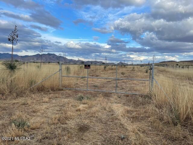 MUCH IMPROVED lot in Elgin, Fantastic views, Solar well with Storage tank, whole house water filter system with UV filter, Timed irrigation under ground, 5 ft. no climb fence around the property. Perc Tested, 2500 Gallon water storage, 8x8 shed, Fruit and Nut trees planted, Shade trees planted all on  irrigation.