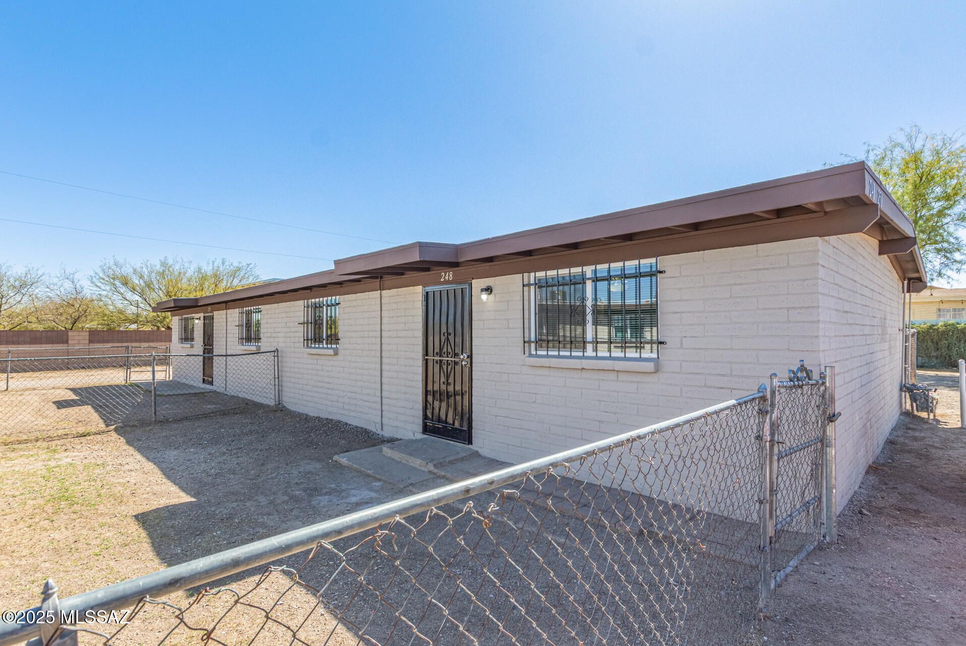 Incredible investment opportunity.  This fully remodeled 4plex is a stone's throw from Tucson's thriving downtown and just a 10 minute drive from the University of Arizona.  Each unit is 2BR/1BA all have been fully updated with new flooring, new interior and exterior paint, and new ceiling fans. New kitchens with new cabinets, counters, & new GE stainless steel appliances w/ a gas stove. Fully renovated bathrooms w/new vanity sink and new file.  All units have yards.  Adjacent 4plex is also for sale.  This is a chance to pick up a great turnkey rental investment. Units 248, 250 & 252 are leased. DO NOT DISTURB TENANTS. Agent/Owner.