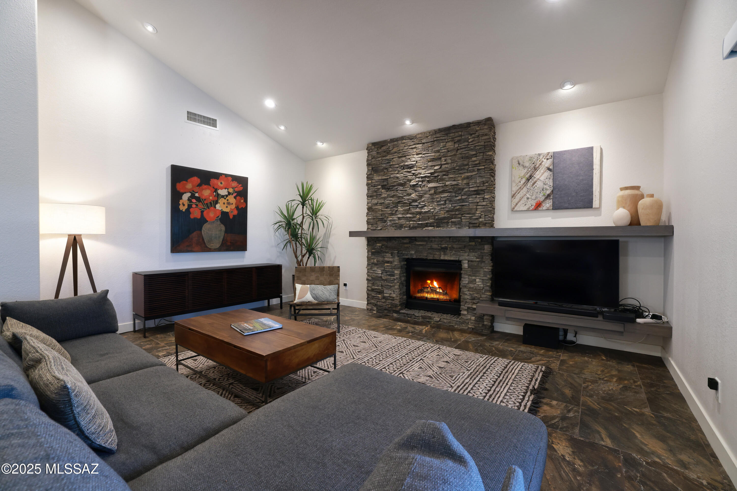 Presenting one of the most impeccably remodeled residences in Ridge 4, in gated La Paloma. A true showcase of design & craftsmanship. No expense was spared in thoughtful selection of finishes, to include 16-ft Pella sliding glass door that vanishes into the wall, creating a flawless transition between indoor/outdoor living. The entertainer's dream patio is equipped w/Kalamazoo pizza oven, built in Heston grill, refrigerator, sink & slate countertops. Custom designed kitchen w/ quartz island, SS appliances & alder cabinetry. Primary suite offers wood flooring, private patio, custom built dresser, rainfall shower, jetted tub, dual vanities& generous closet. Bespoke California closets & storage throughout. Hunter/Douglas multi-shades on all windows. See full list of upgrades in document tab. School district 16, in close proximity to various amenities, hiking trails and golf courses. Inquire about La Paloma Country club membership by calling them directly as prices change. Call or text for an easy showing.