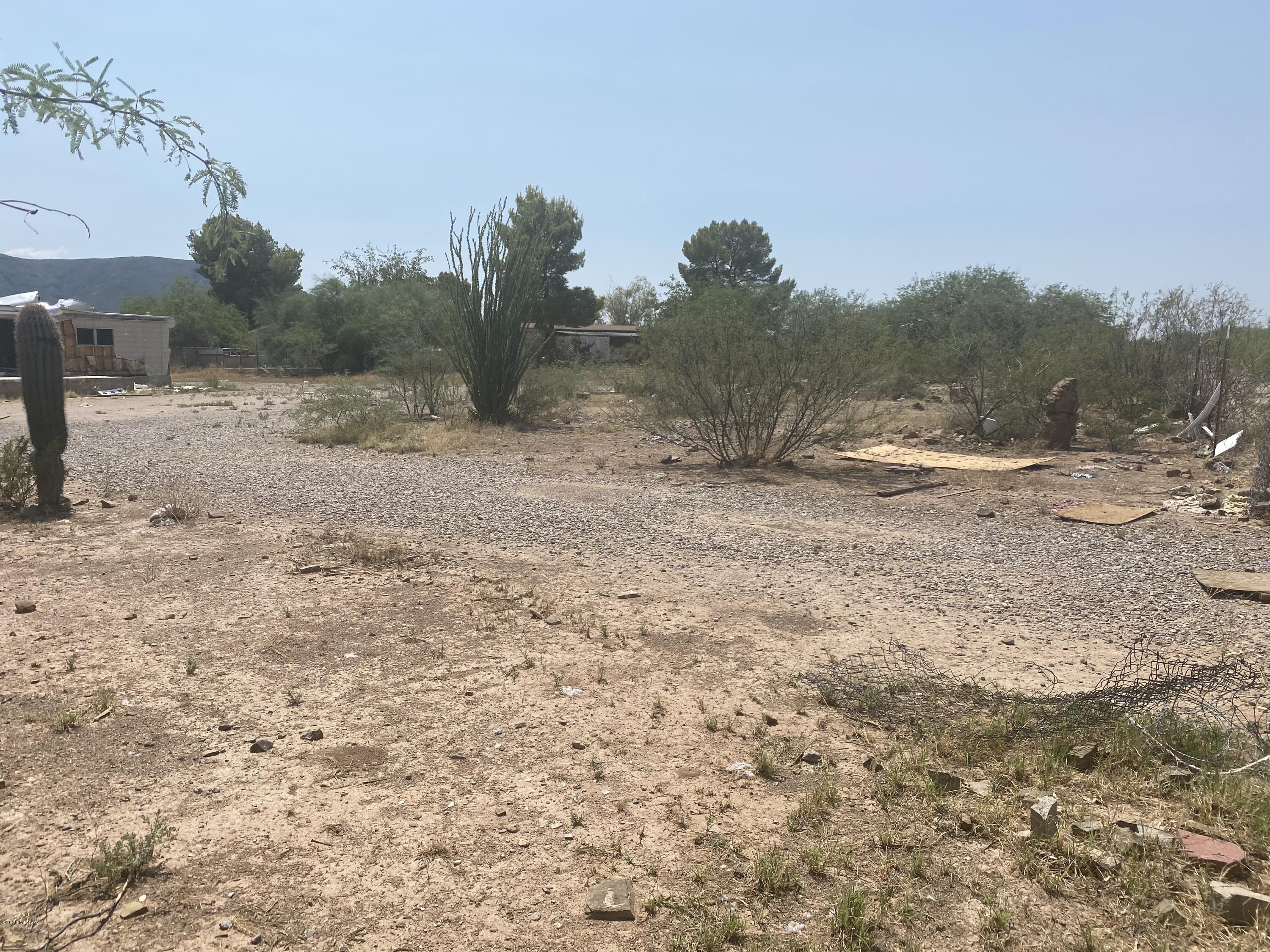 One Acre Lot with breathtaking beautiful Elephant mountain and black mountain views.  Allows two homes per zoning, flat land, fenced.
With utilities.  Sold ''As Is'' where is with no warranties expressed or implied
