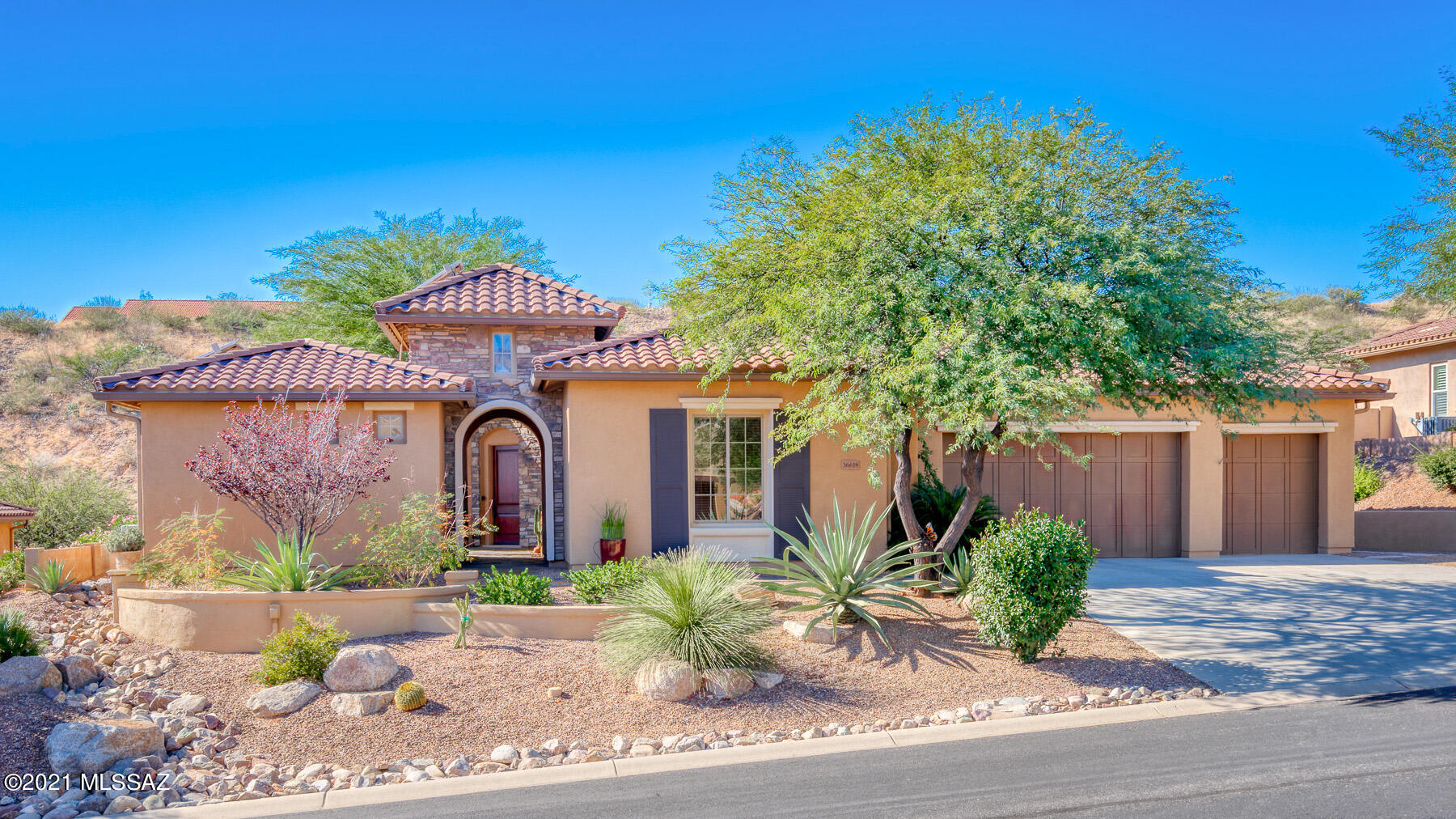 Beautiful Sonoran model in SaddleBrooke's Preserve is ready for you. Welcoming slate walkway leads to private courtyard w wood burning fireplace & mountain views. Open great room w custom wood beam coffered ceiling, & gas fireplace w stone surround. Wall of windows opens to Arizona Room. Gourmet kitchen w Thermador stainless appliances has butler's pantry w plenty of storage & leads to formal dining room. Owner's retreat w built-in dresser, sitting area, & en-suite w separate vanities, walk-thru shower, soaking tub. Large walk-in closet has easy access to laundry. Convenient powder room, den, & guest suite + private casita & 3 car garage. Sparkling pool w the natural desert behind affords great privacy. Whether entertaining or just enjoying SaddleBrooke's lifestyle, this home has it all.