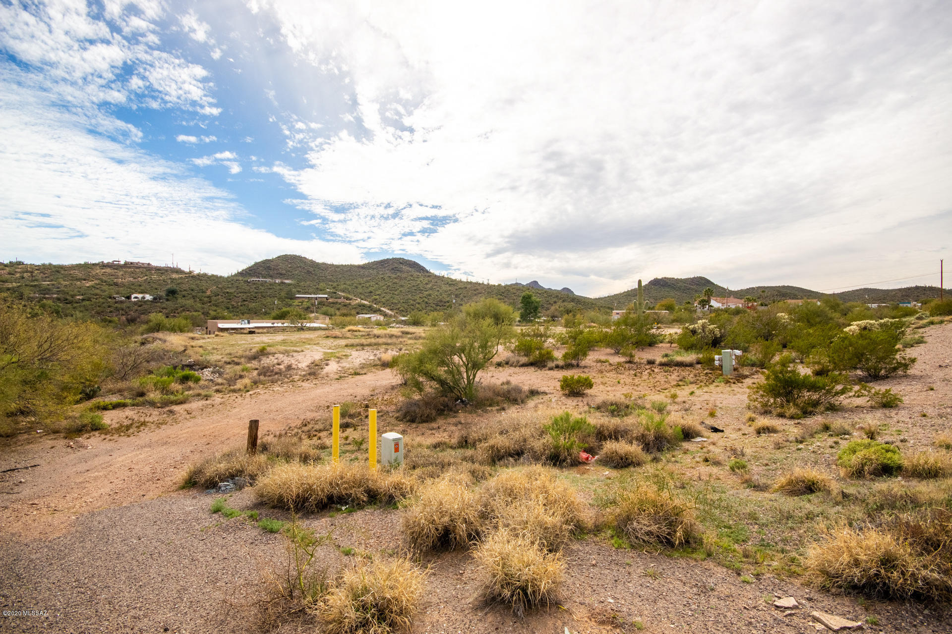 Excellent opportunity to purchase vacant land in southwest Tucson. Build the home you have always dreamed of surrounded by wide open spaces and gorgeous mountain views. Two separate lots to be sold together totaling 1.76 acres of property. Purchase includes parcels 2535 & 2537. Excellent location, nestled just off of the Ajo Hwy, not far from the I-19 for easy access to everything Tucson has to offer. Lots of possibilities for this flat, ready to build on land. Come see it today.