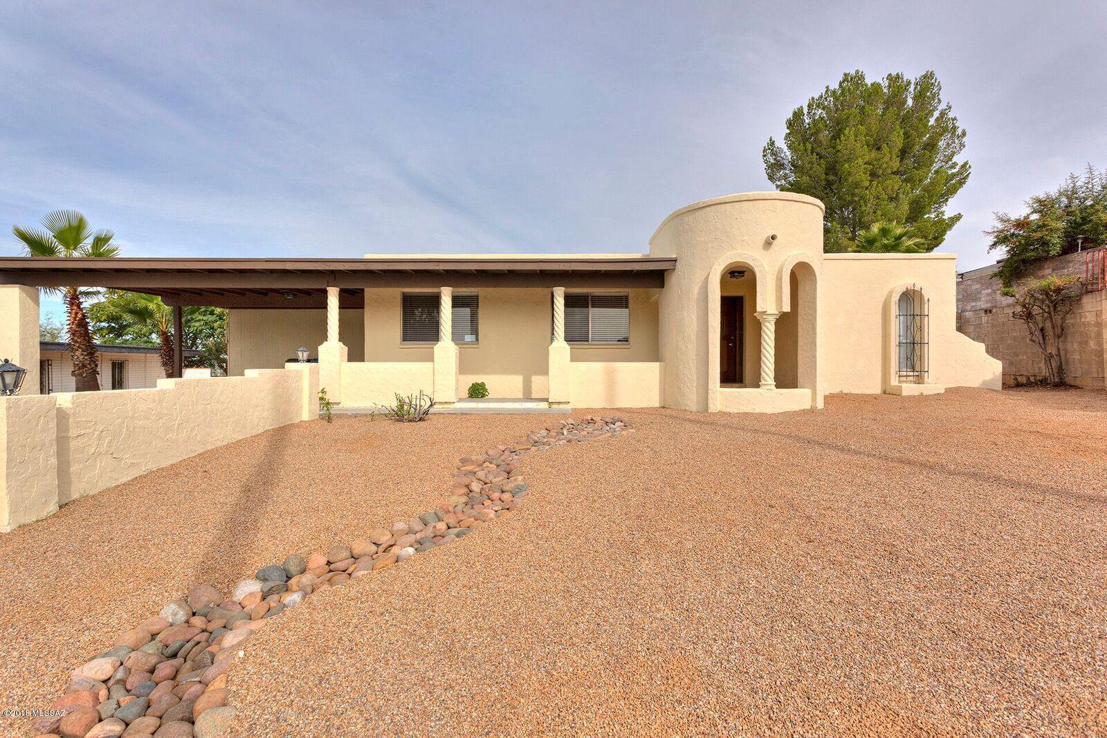Minuets away from the Hospital. This beautiful remodeled  home features an open floor plan concept. Brand new tile flooring through out the home. Modern lighting and brand new natural tiling displayed in bathroom showers. Walk in shower in Master bathroom. Nice covered front carport and a well maintained yard. Ready to make this your new home!