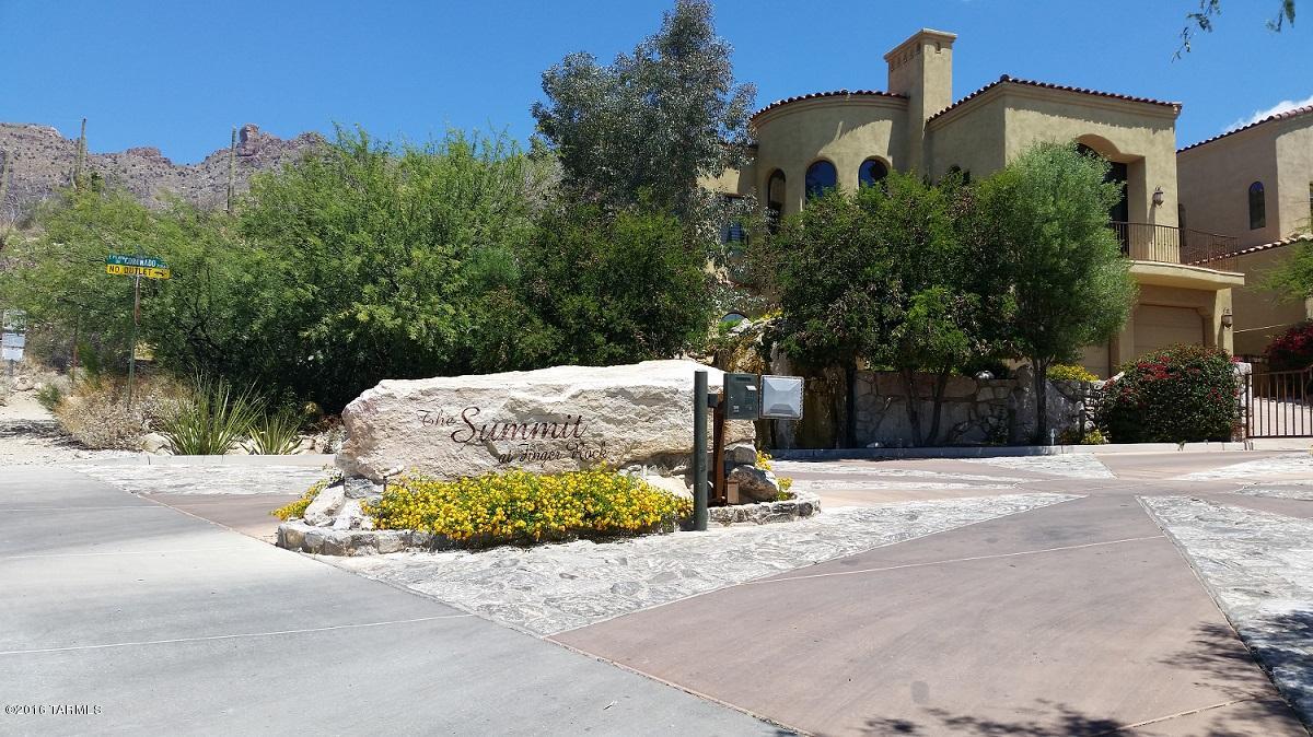 Breathtaking city and mountain views! This amazing gated community lot backs to the national forest! Sparkling city lights from your front porch.Whether your downsizing or looking to build your dream home close to all the fine restaurants and bars this lot is for you. Its the last one in the subdivision. It is flat and ready to build on.The utilities are at the lot. Hurry before this gem is gone!