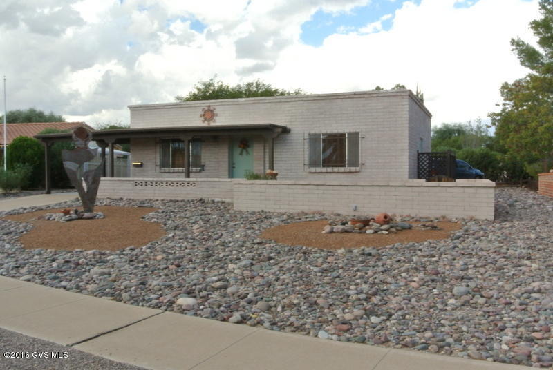 Just the sweetest house on a quiet cul de sac! Large front patio to enjoy the sunrise & views of the Santa Rita Mtns or the back patio just to sit under the shade of the large Mesquite tree. This tastefully furnished home is move in ready w/recent interior paint & neutral carpet. Roof recoated 2016; new refrigerator & garbage disposal in 2015; furnace & air conditioner replaced in 2011; gas water heater new in 2009, gas lines from the alley to the house replaced in 2009. Wonderful utility room has skylight and sliding glass door to the back patio-a great place for a studio, hobby room or workshop (laundry area 10x7, storage 10x10). You can't miss this house with the original metal sculpture by Tucson artist Ken Webb in the front yard. Perfect for full time, part time or as an investment