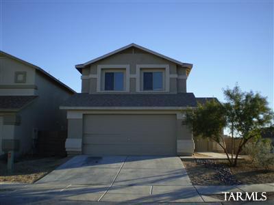 Two story home on corner lot. Large walled yard w/covered patio. 3 bedrooms + 2 full baths upstairs. Master bedroom has large bathroom, walk in closet and sliding doors to deck. Half bathroom on first floor. All appliances including washer/dryer. Ceiling fans. 2 garage remotes. Walled yard. Close to shopping, medical facilities, interstate, etc.