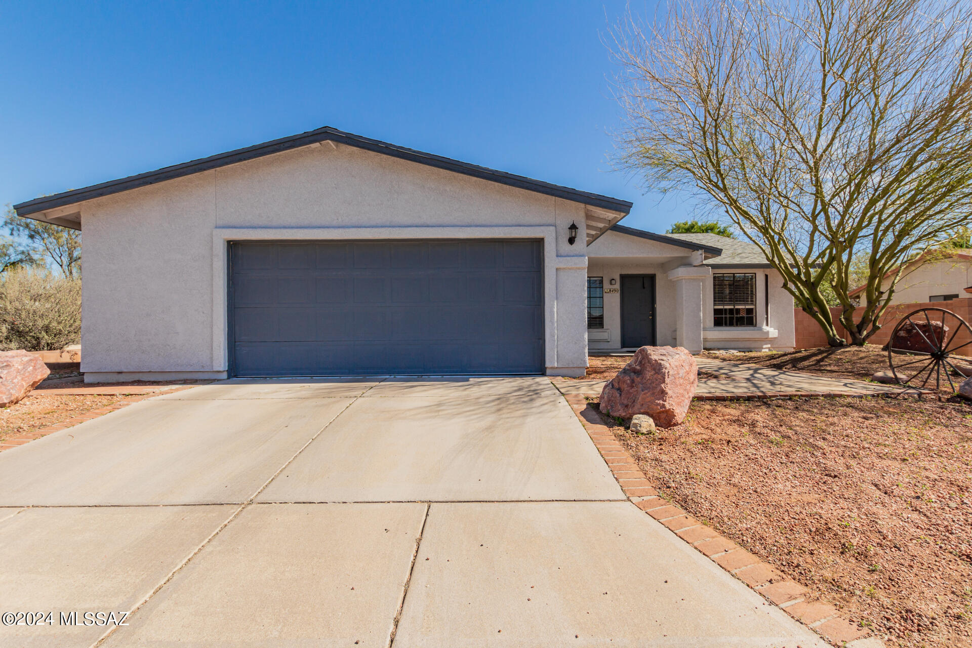 Discover the perfect blend of comfort and style in this 3-bedroom, 2-bathroom, 1,594 sq ft. home nestled on the northwest side of Tucson. This residence welcomes you with a well-designed open concept living space with brand-new vinyl flooring throughout the living area and kitchen. You'll have a scenic backdrop for outdoor activities and leisure with an inviting community pool and neighborhood park. Your new home awaits, offering a harmonious blend of modern living and community charm!