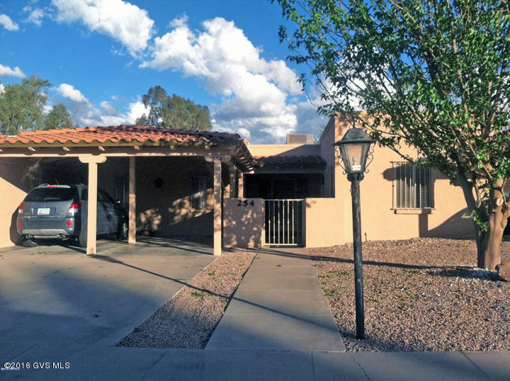 Buyers backed out, their loss your gain! Rare find in the heart of Green Valley, 2 Br/2 BA townhome that has been upgraded, comes fully furnished. Home sits on the 11th fairway in Green Valley Country Club, with Mountain Views. Plantation shutters, wood and tile flooring Beautifully decorated. This one will not last.