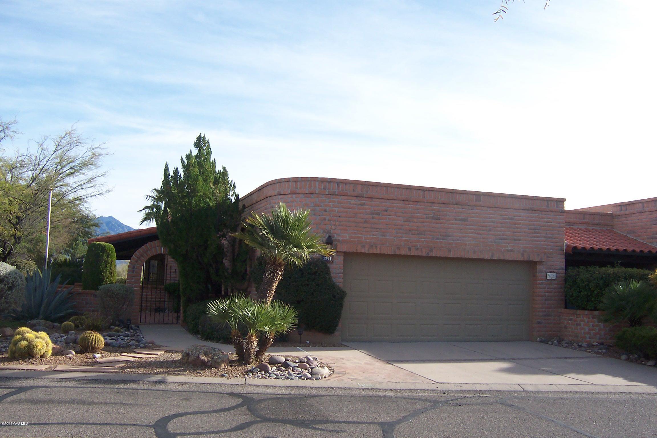 As soon as you walk into this 2 bedroom, 2 bath TH in Canoa Ridge, you will be drawn to the panoramic, majestic mountain views through the patio doors. No homes directly behind, only common area. Spacious great room w/wetbar and dining area. Kitchen has granite counters, breakfast bar and eat-in area. Fabulous views from the master suite, as well. Master bath has garden tub, shower, dual vanity and walk-about closet. Guest bedroom has its own front patio. Large backyard with wrap-around private patio is wonderful for entertaining, having a relaxing dinner or watching the evening stars. The views from this home are exceptional! Electric sun screens. Interior freshly painted, Bryant Gas-Pac 2010-roof recoated 2015(5-yr warr)- Truly Nolan termite contract, AHS Home Warranty. HOA $561 annual