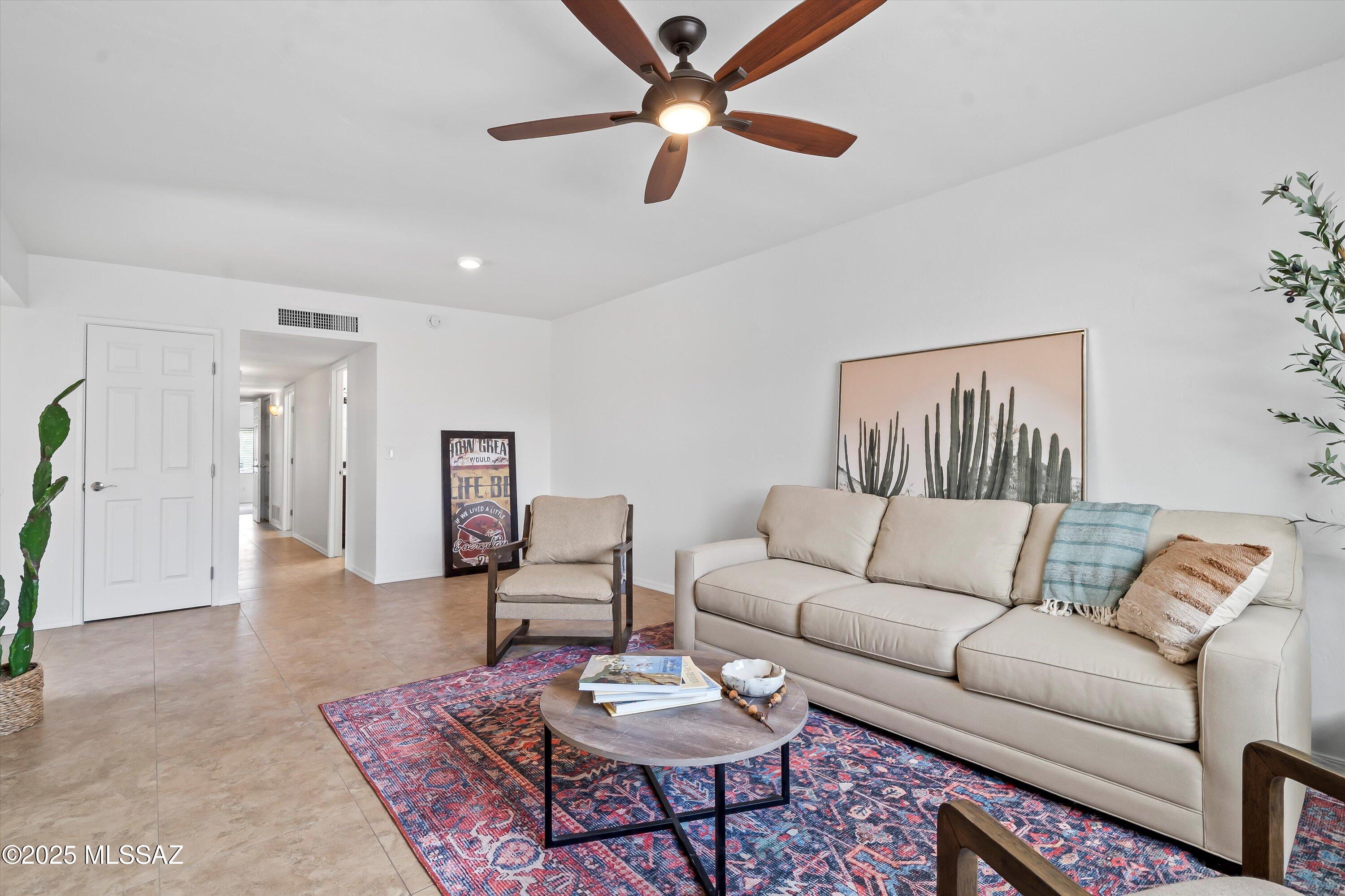 Discover this updated 3-bed, 2-bath townhouse with approx. 1,275 sq ft of comfortable living space—the 3rd bedroom is versatile as it can be used as a bonus room (was used as a bedroom, no closet) or is also perfect for a home office or guest space. The updated bathrooms feature modern finishes. This townhome offers an open layout and refreshed interior, creating a warm, inviting feel. Located near local amenities and best of all—no HOA fees! A rare and flexible find you won't want to miss.