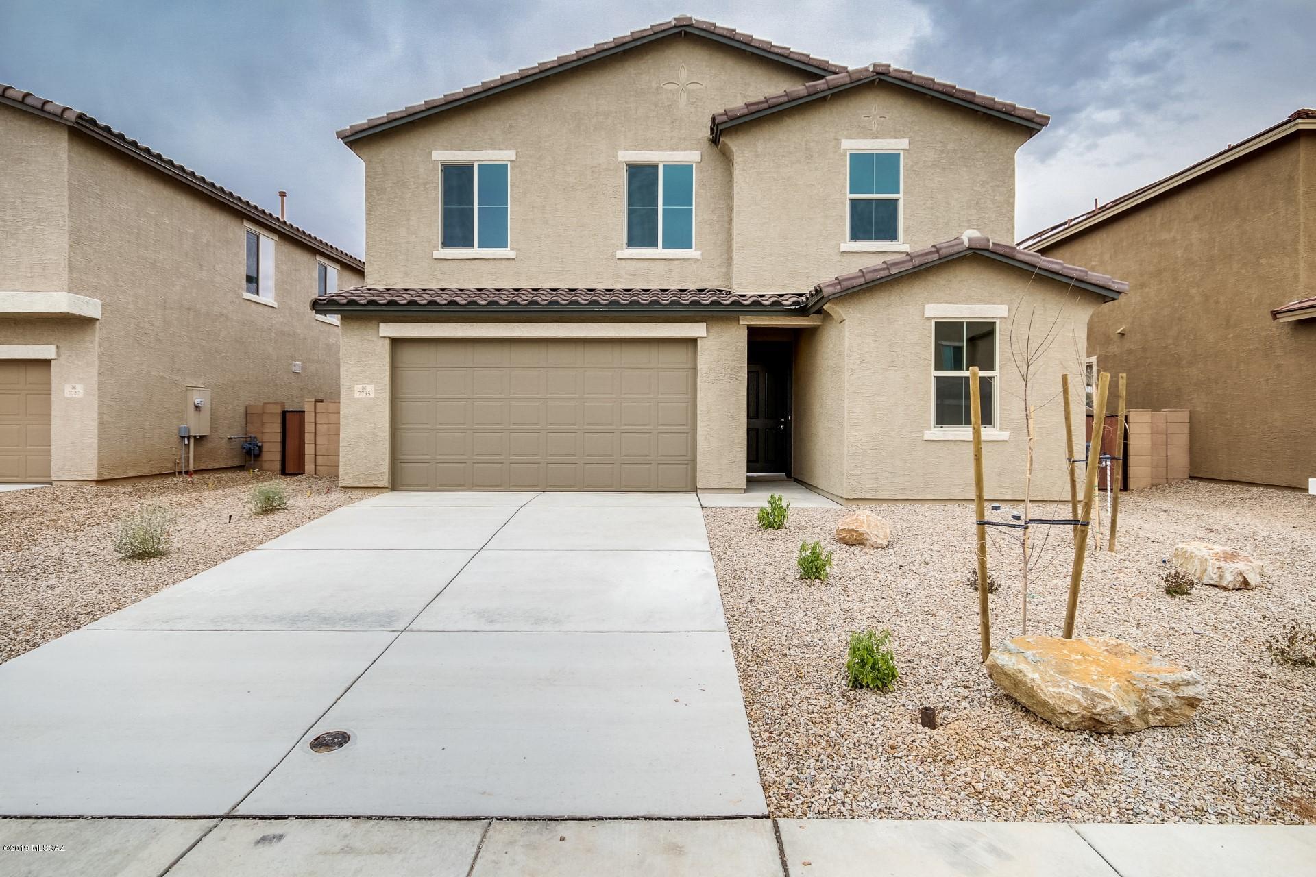 Stunning brand new Richmond home on huge lot!  This home is full of upgrades!  This wide open floorplan will embrace all your decor plans!  Beautifully tiled floors, rich dark cabinetry and eye catching granite countertops create this perfect kitchen.  A pantry adds the finishing touch.  A breakfast bar and dining area offer options for entertaining! Generously sized living space in both downstairs and loft area will host all your friends and family! The master suite hosts double sinks and shower.  A huge walk-in closet is always highly desirable.  This new home is situated on a large lot that is just waiting for a personal touch.  Create your own oasis in the desert!  Put this home on your list to see today! Be a part of this new neighborhood in your new home!