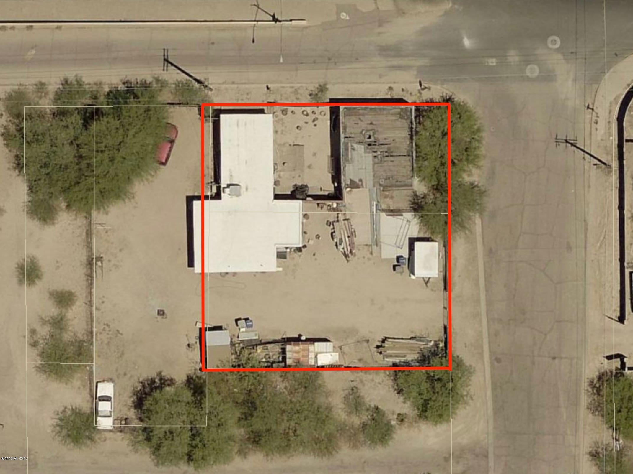 Fix up property.  the property consists of two C-3 zoned lots. Two buildings in need of complete rehabilitation or tear down and start fresh. West buildings currently being used as a home..