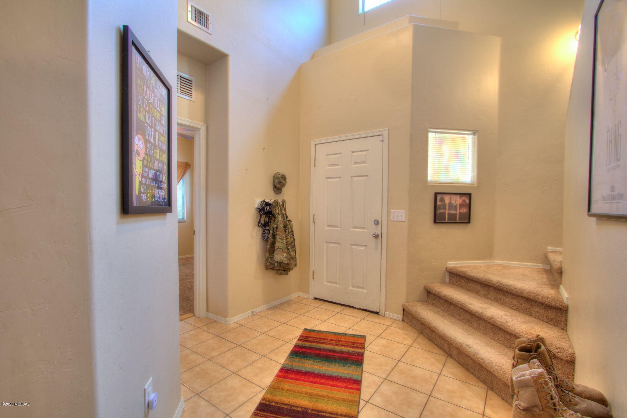 Welcome home! Easy freeway access, close to shopping and downtown. This property features living, dining, kitchen, restroom and guest bedroom downstairs as well as a loft, three more bedrooms upstairs, two restrooms and the laundry room.  The master bedroom is large enough to have a seating area as well as your bedroom furniture. 
So much space! Easy low maintenance front yard and step out back to turf and a cute garden.