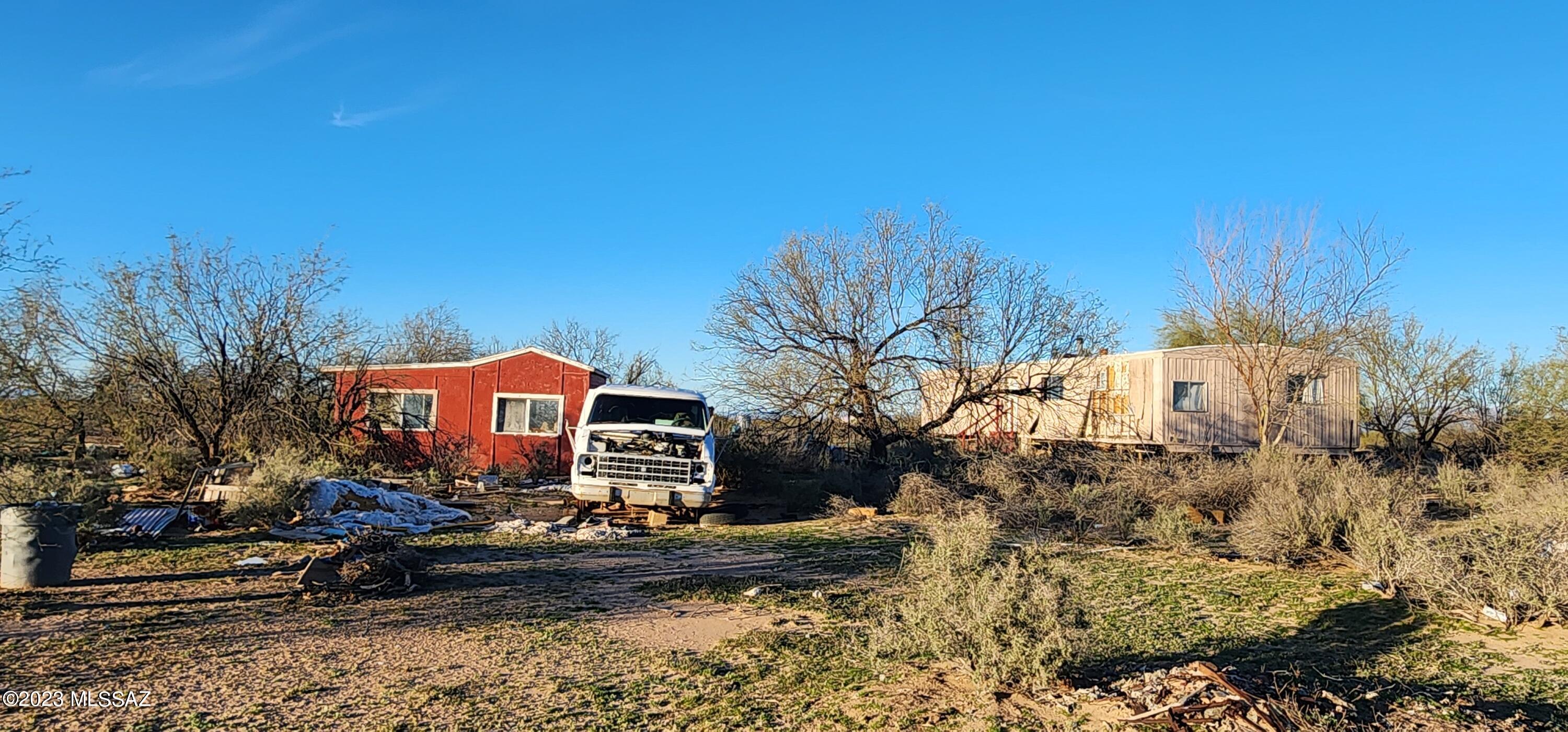 5 Acres of Peace & Quiet in Picture Rocks area with Saguaro National Park-West nearby. 360 mountain views, gorgeous sunrises and sunsets. Electric to lot line. Certified Septic and Shared Well.  3-4 miles of dirt/sand road, 4x4 truck needed, backs up to County land. Possible Seller Financing w/large down payment. Twin Peaks Rd to Sandario, go south on Sandario Rd,  turn West on Emigh Rd,  then South on Avra Rd, West on Dally Rd,  South on Shaky Rock Trl to address.