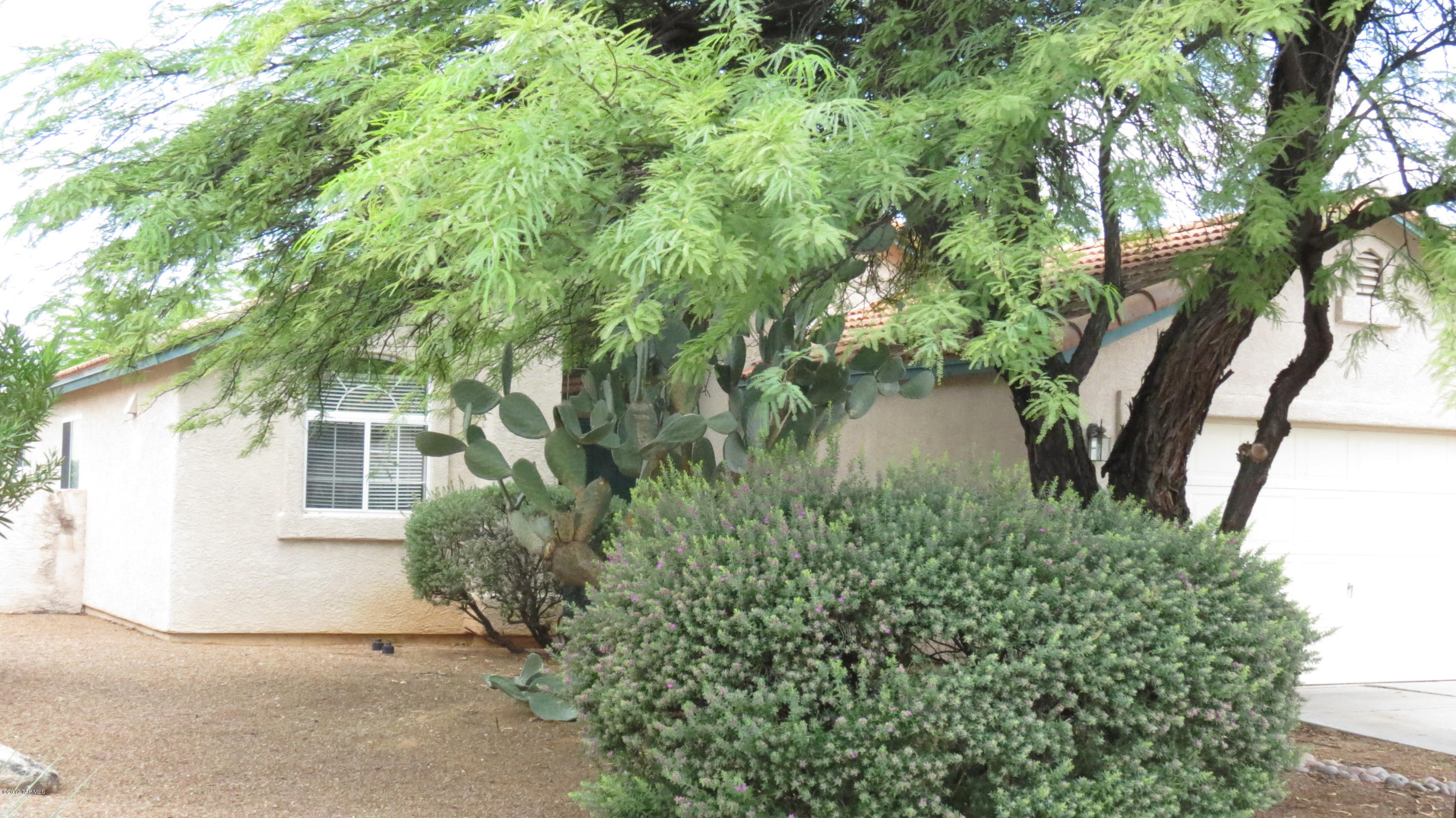 Awesome 3 bedroom 2 bath - great room design with very spacious rooms throughout, lots of neutral colors, covered patio, nice catalina mountain views from the rear yard. This property is close to schools, shopping, restaurants, parks and more. This property is clean and ready now!
