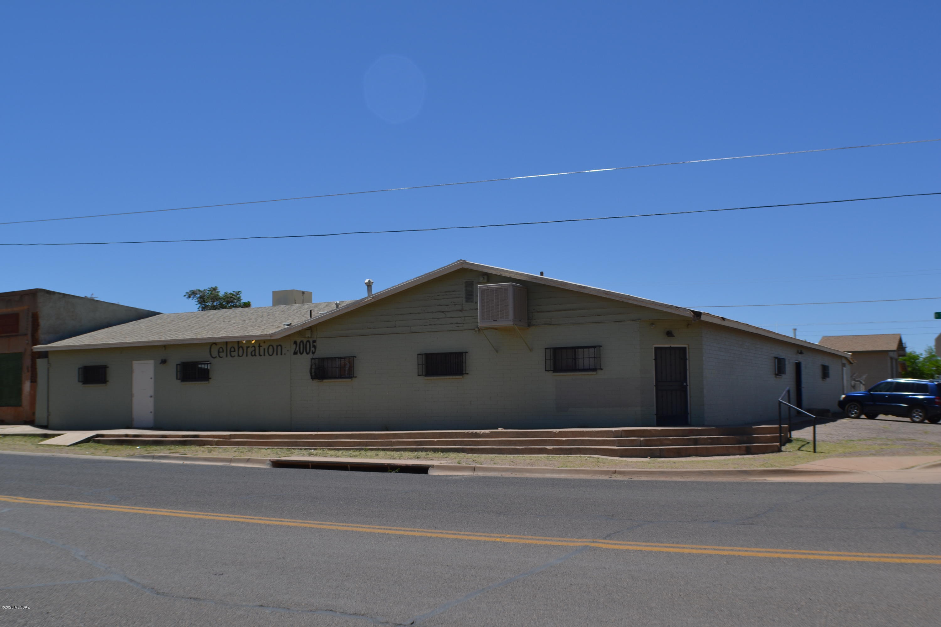 BUSINESS OPPORTUNITY POTENTIAL! This building could be used as a restaurant, bar, dance club, entertainment venue, the possibilities are endless!! Well maintained, used to rent out for events such as proms, quinceaneras, business parties and large family get-togethers. All kitchen appliances and bar appliances transfer with sale. Seller will consider Owner-Carry terms with at least 35% down