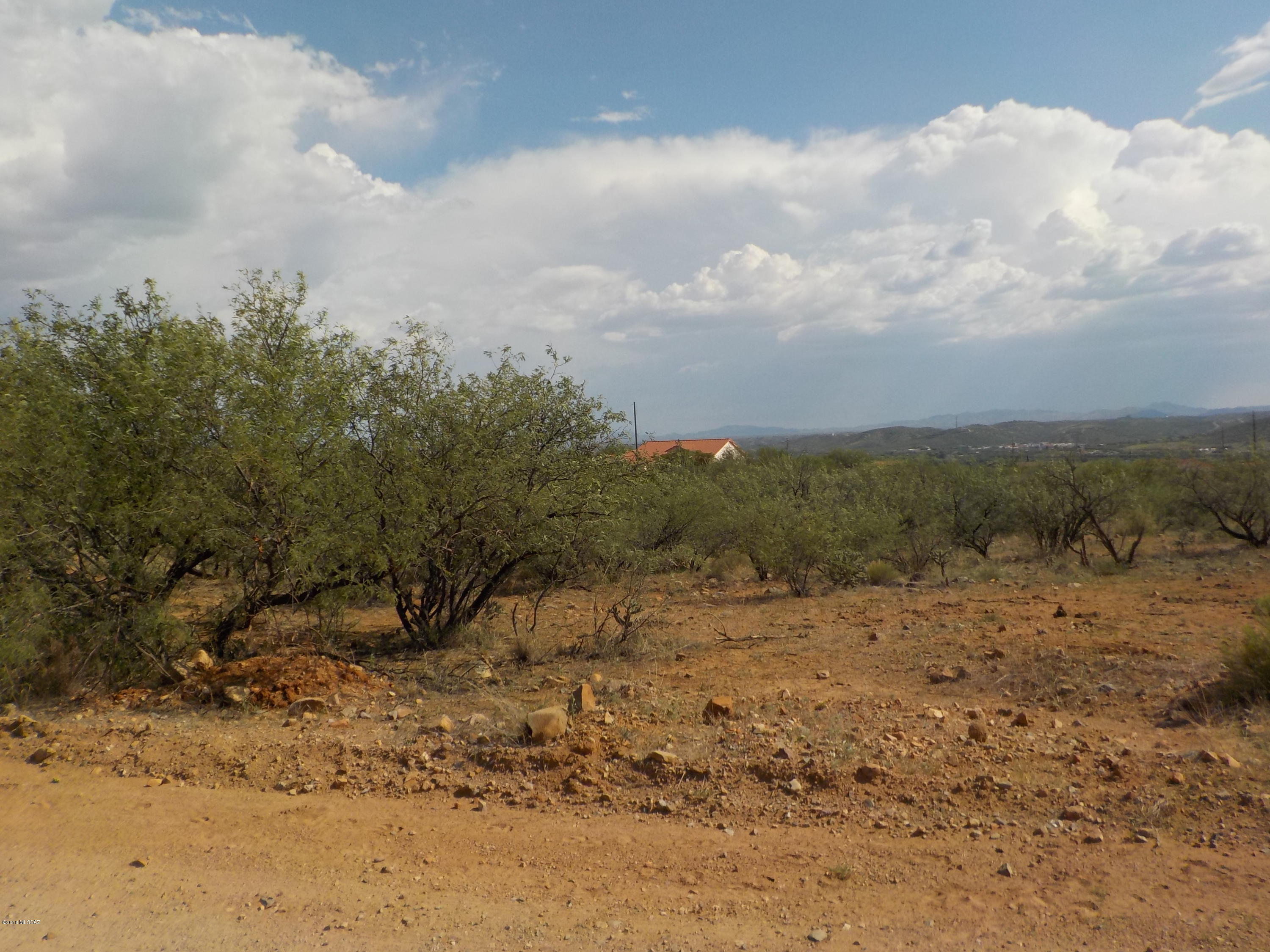 Nice flat lot with view to build your next home.