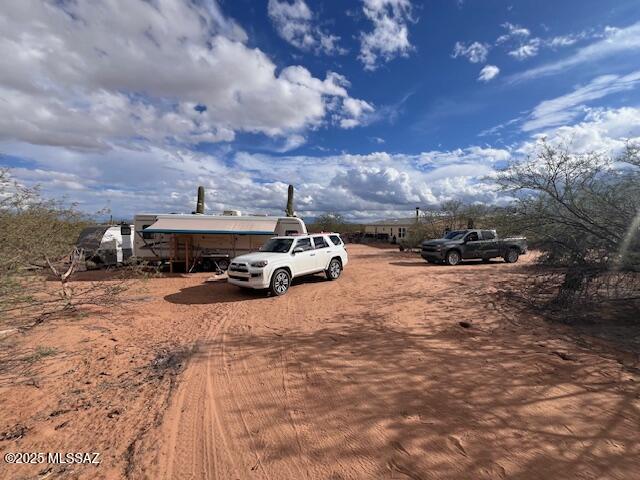 Beautiful and private property, last parcel on road.  Saguaros and mature trees.  No floodplain  or HOA.  1/10th well share, pipe in ground from well site to NE corner and electric pedestal w/ active meter on the property.  MSFR impact fee paid, perk test & septic feasibility letter.  Owner/Agent.