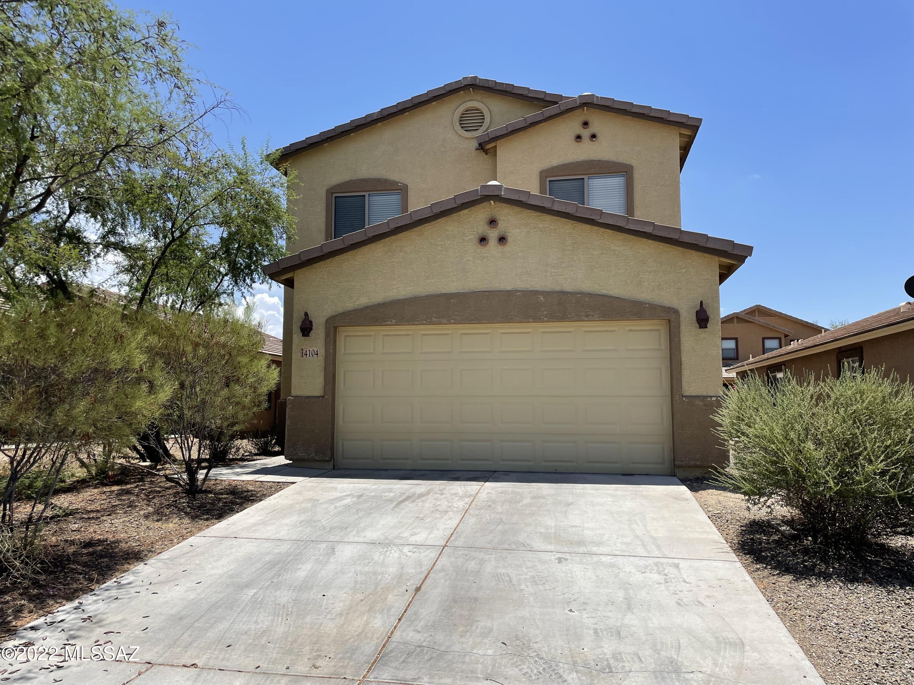 Spacious four bedroom home plus double door den. Granite kitchen countertops, stainless steel appliances, and a powder room on the ground floor. Downstairs flooring is a mixture of luxury vinyl plank and tile, with a nice open great room.  Laundry room is also located on the ground floor. Upstairs you will find four bedrooms and two additional bathrooms. Great floorplan! Backyard is low care with a covered patio and gravel landscape. Two well behaved pets welcome with pet fee.